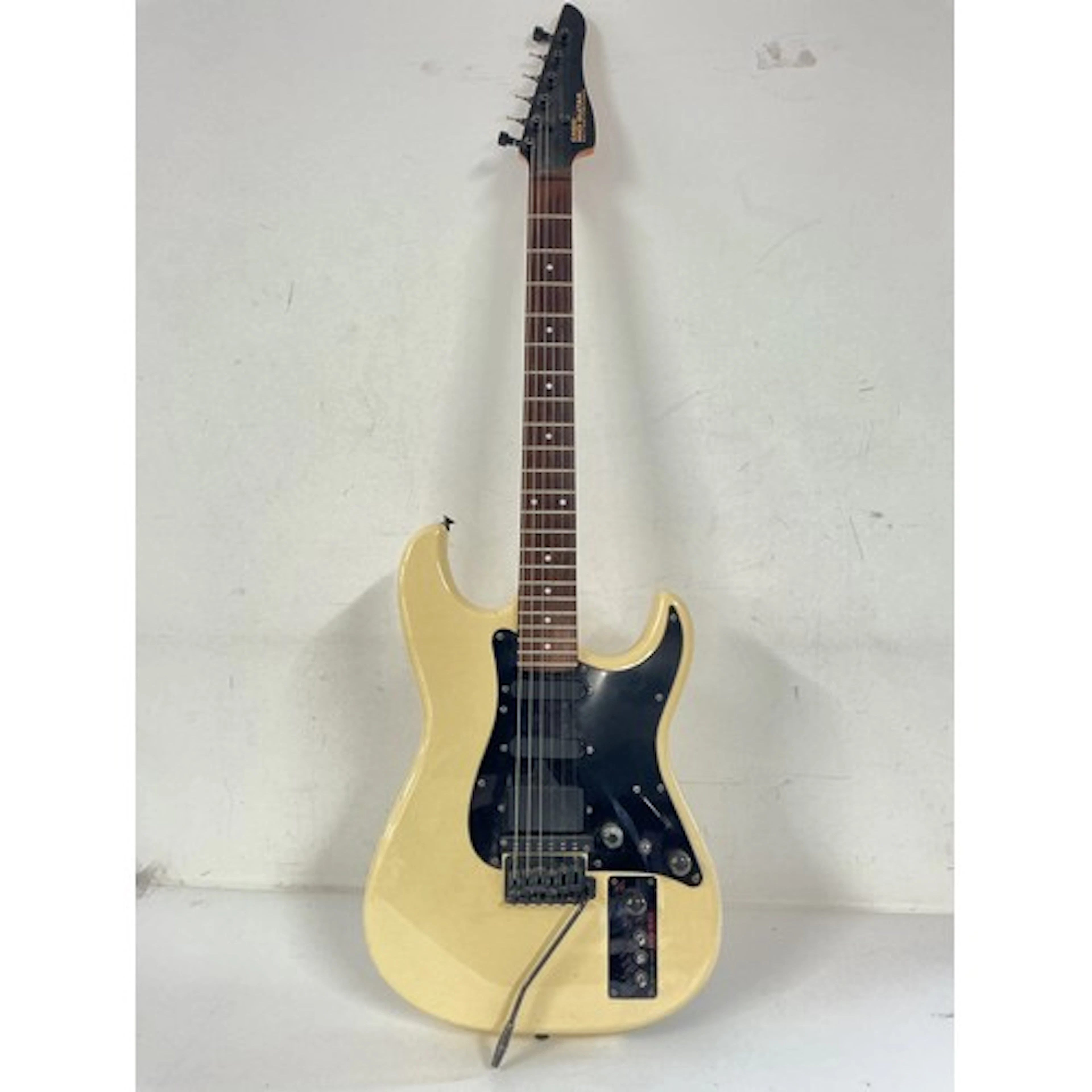 A Casio Midi MG-510 electric guitar. Needs new tuning pegs. ...