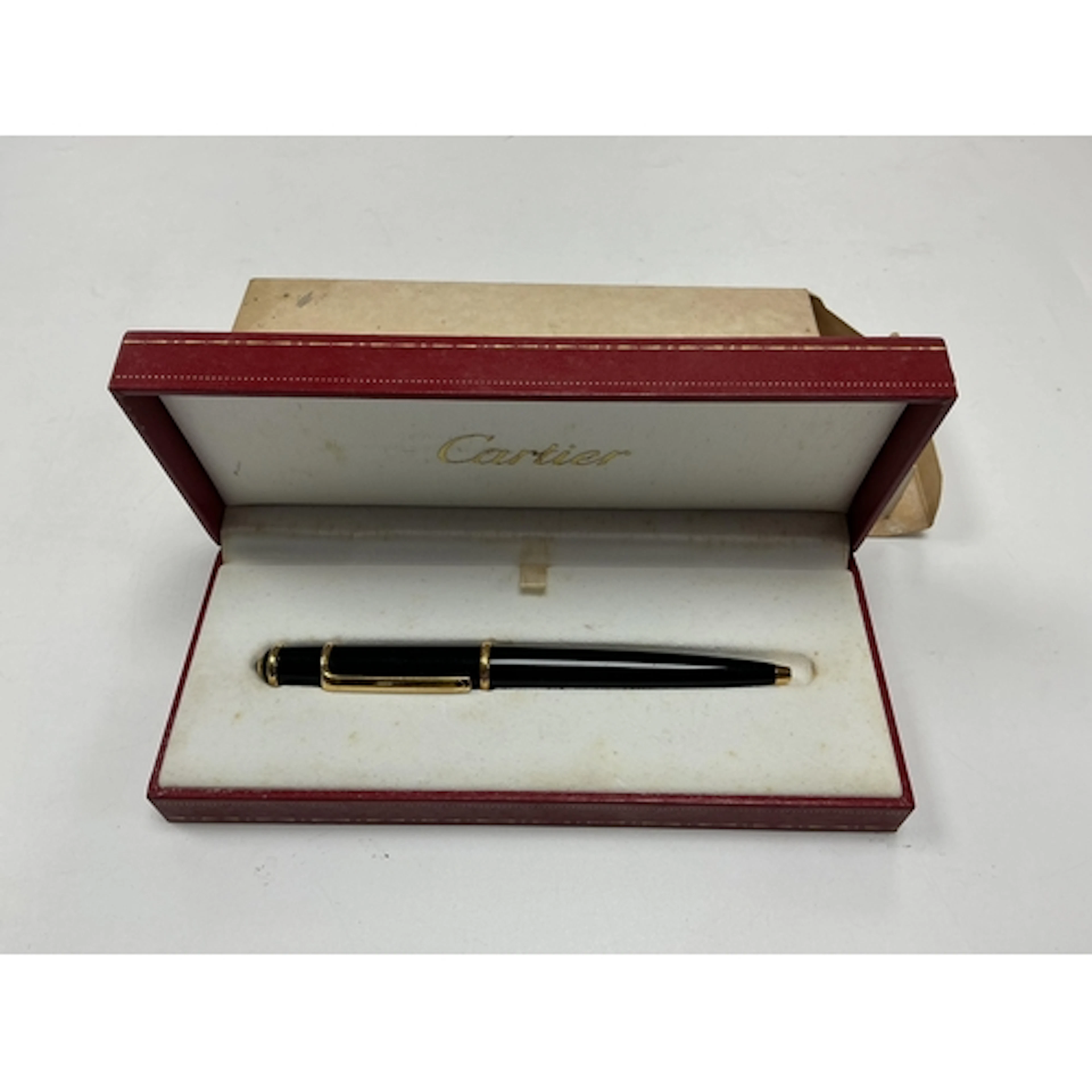 A Cartier Santos ballpoint pen in black, in original box...
