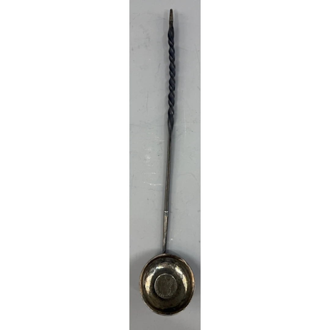Decorative Arts: a late 18th or early 19th century toddy lad...