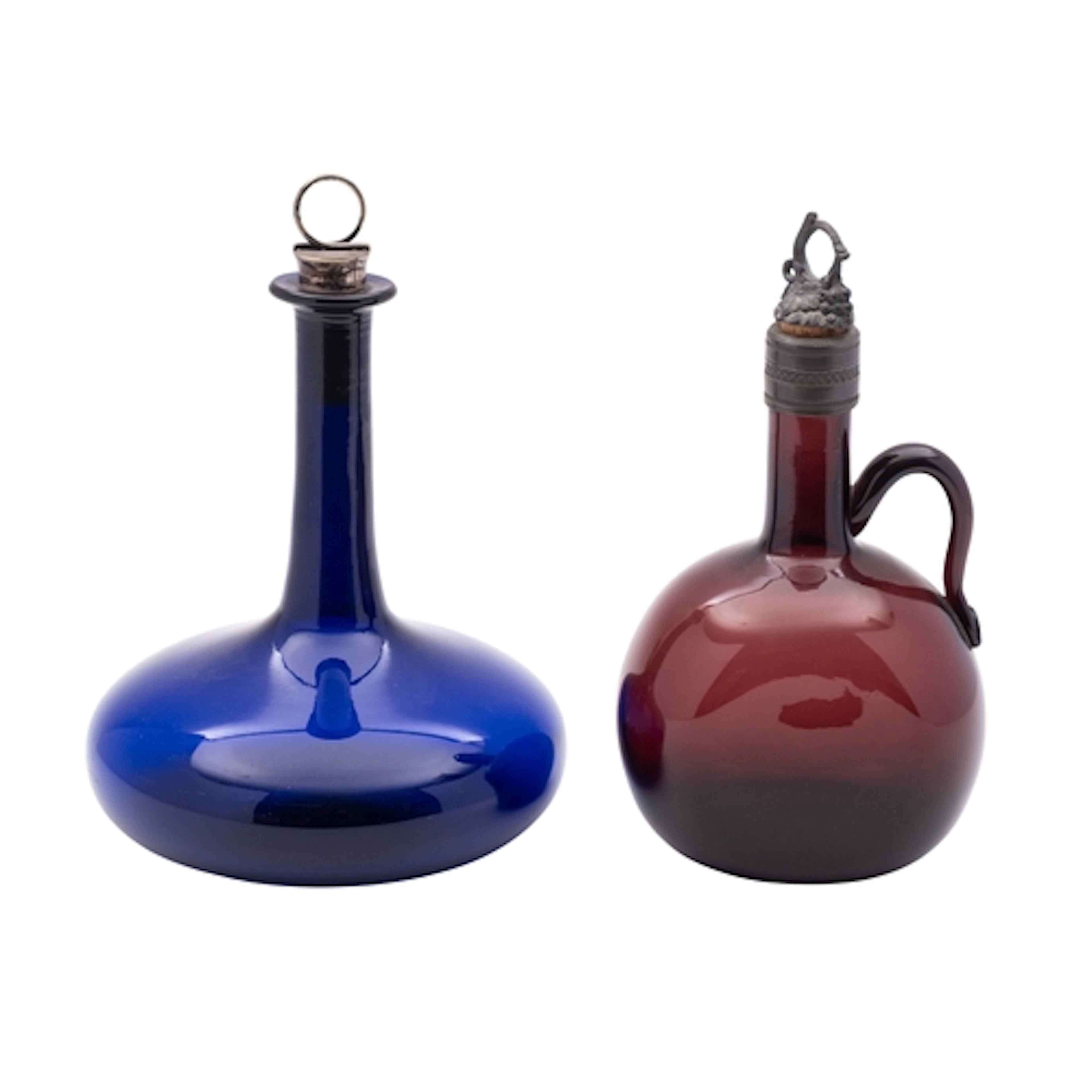 A 19th century blue glass 'Mel' decanter and an amethyst gla...