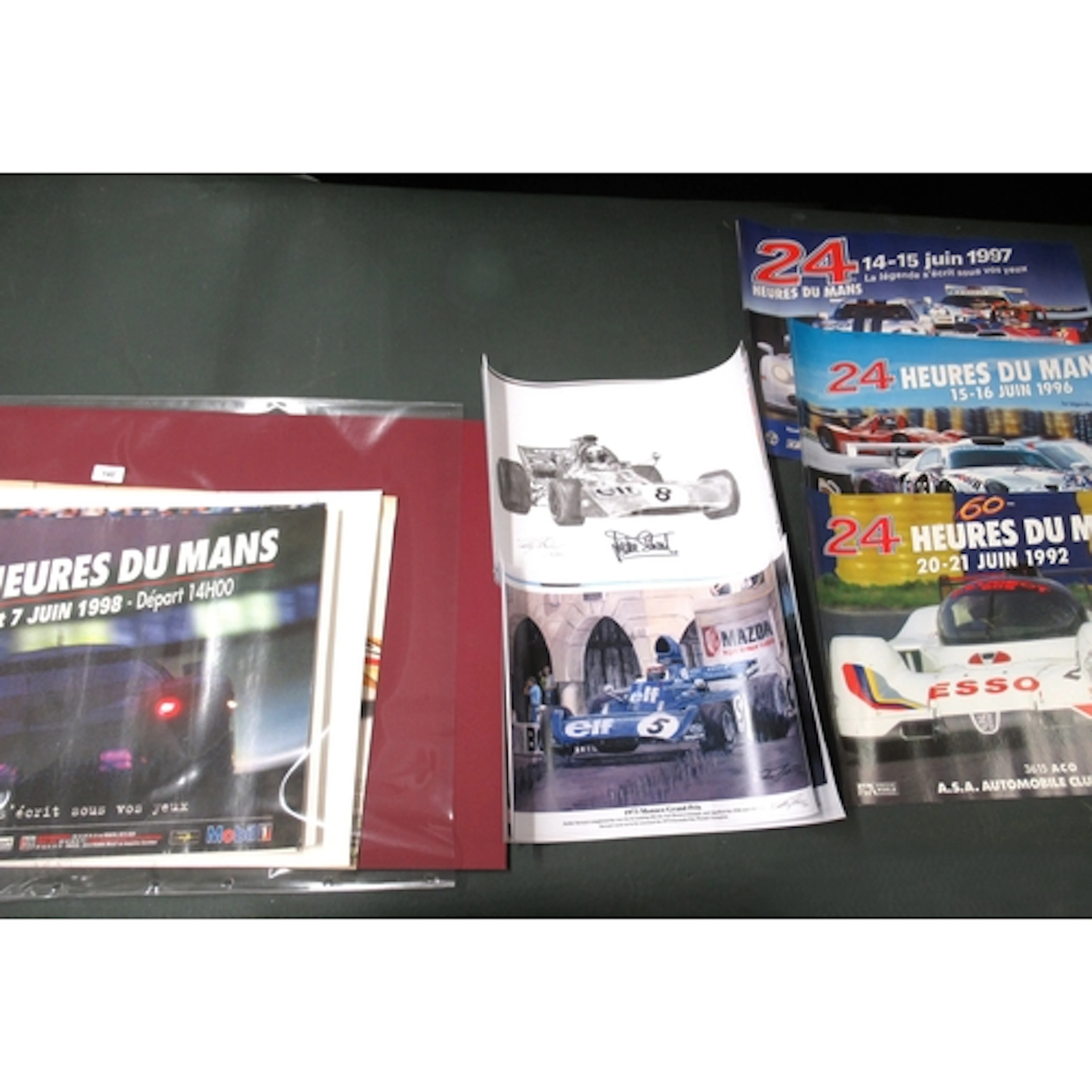 Quantity of motor racing posters, etc.