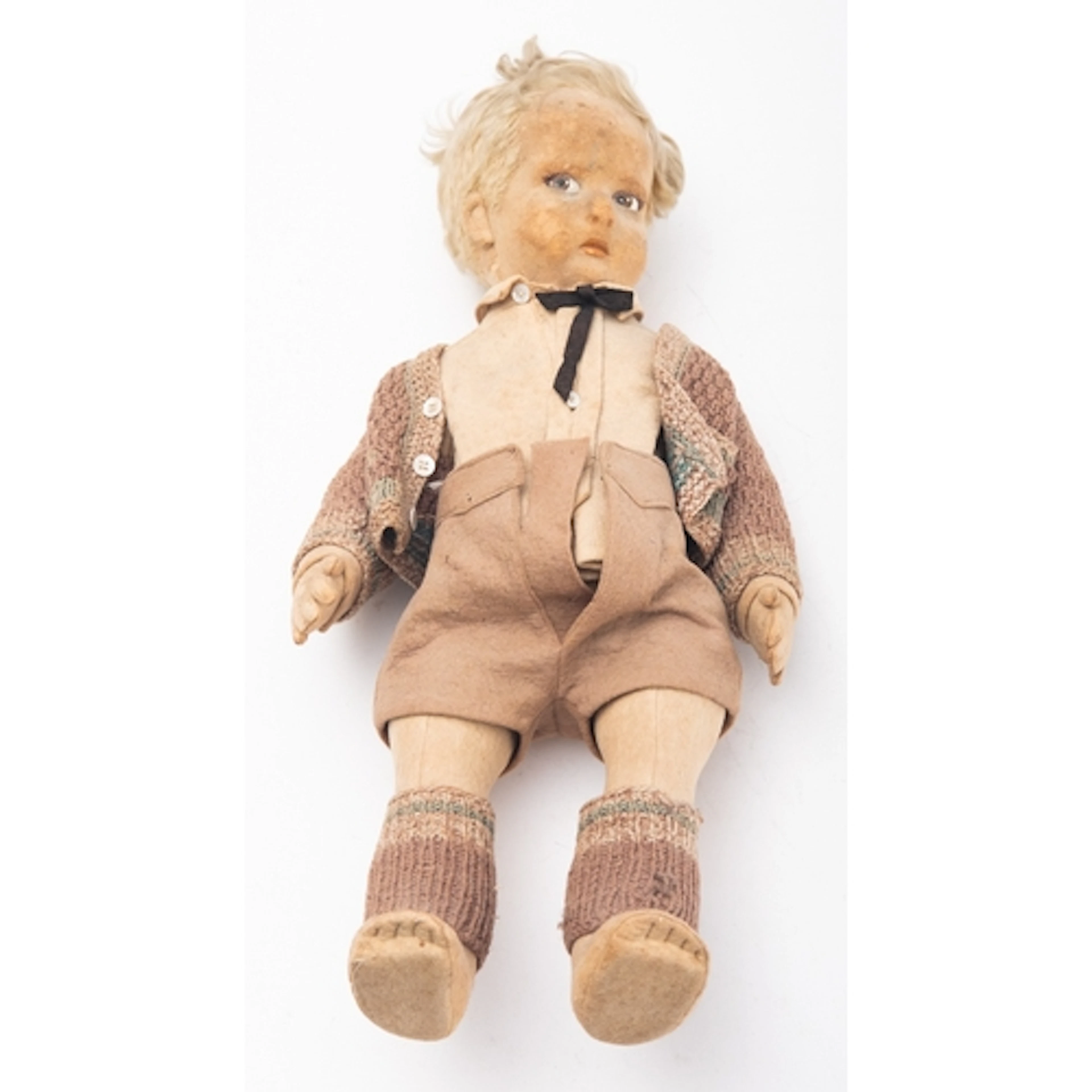 An early 20th Century Lenci felt doll. Modelled as a boy wit...