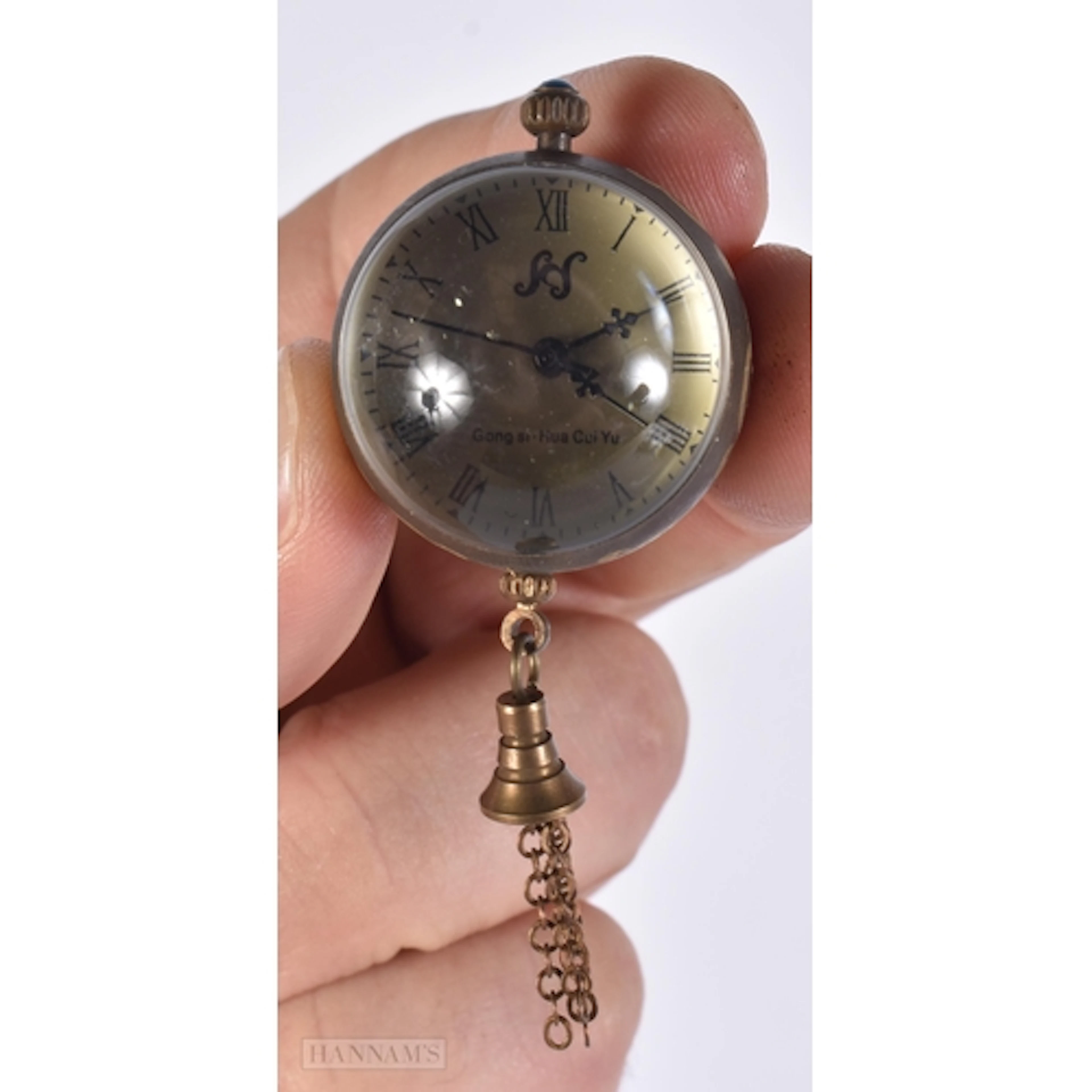 A BALL WATCH. 8.2 X 3.6 cm. running