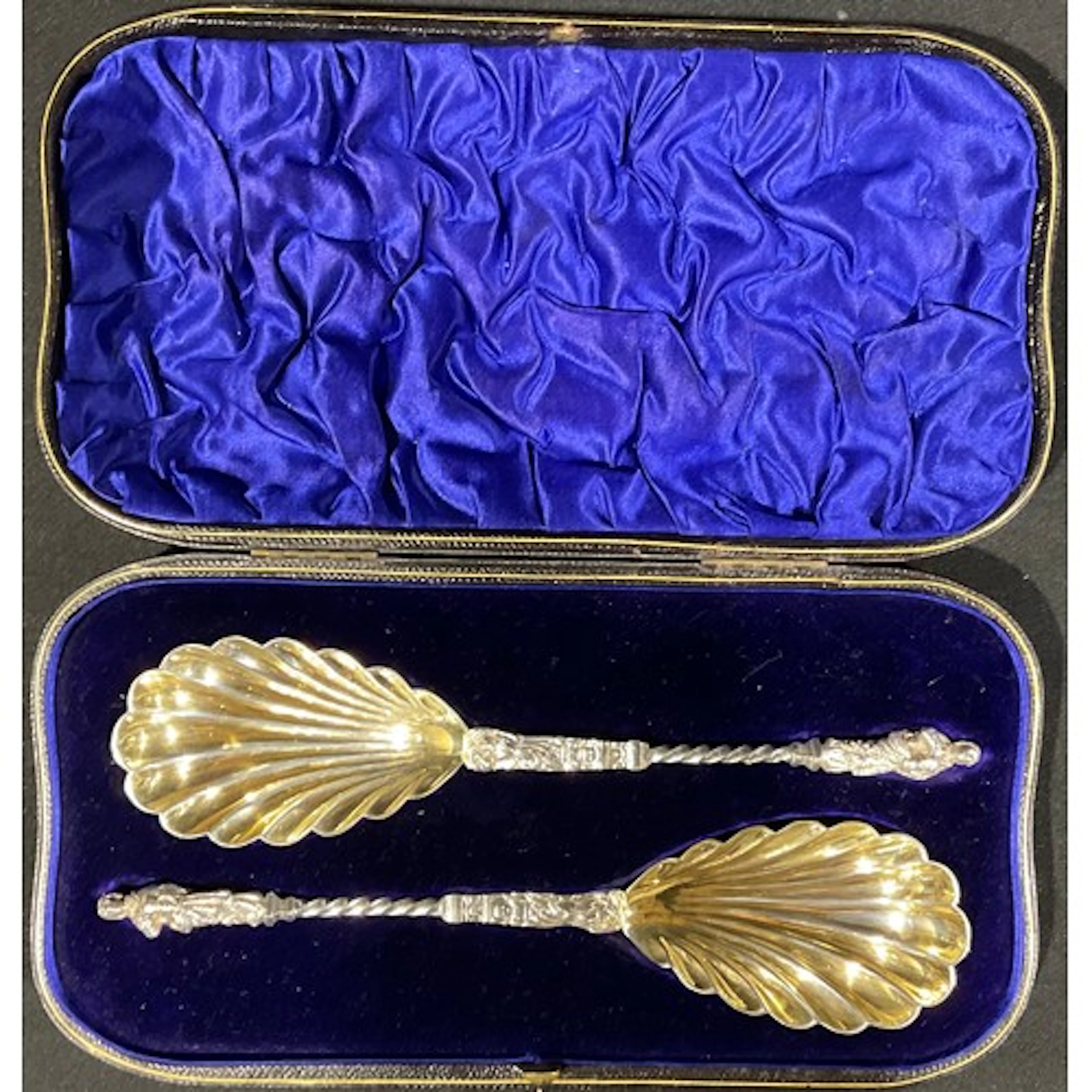 A pair of Edwardian silver apostle spoons, each finial cast ...