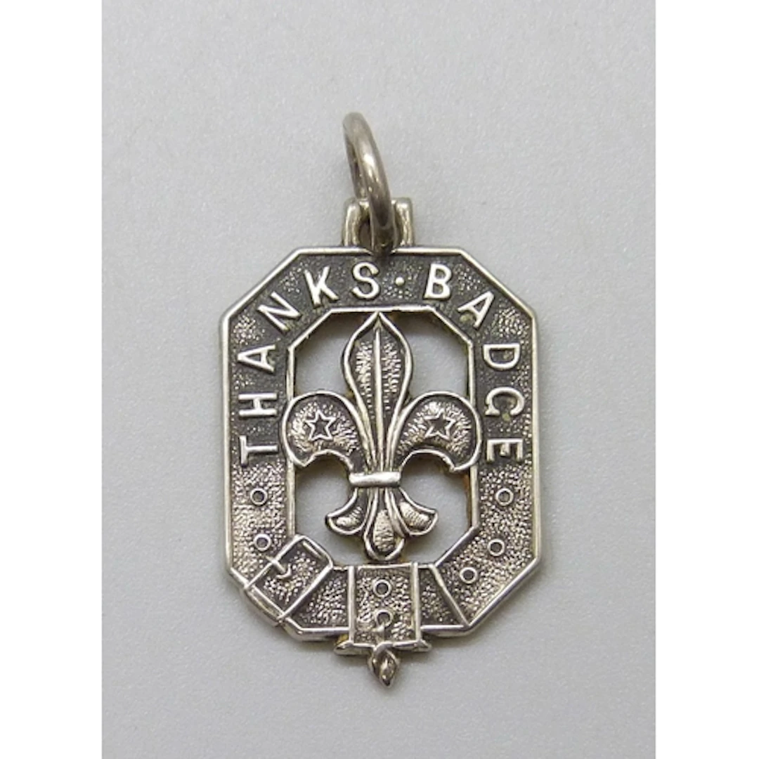 A silver Scout pendant/brooch, Birmingham, 1937, with origin...