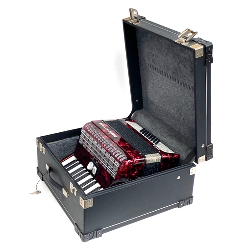 A Walther Teeny 48 Bass Red accordion, little used with some...