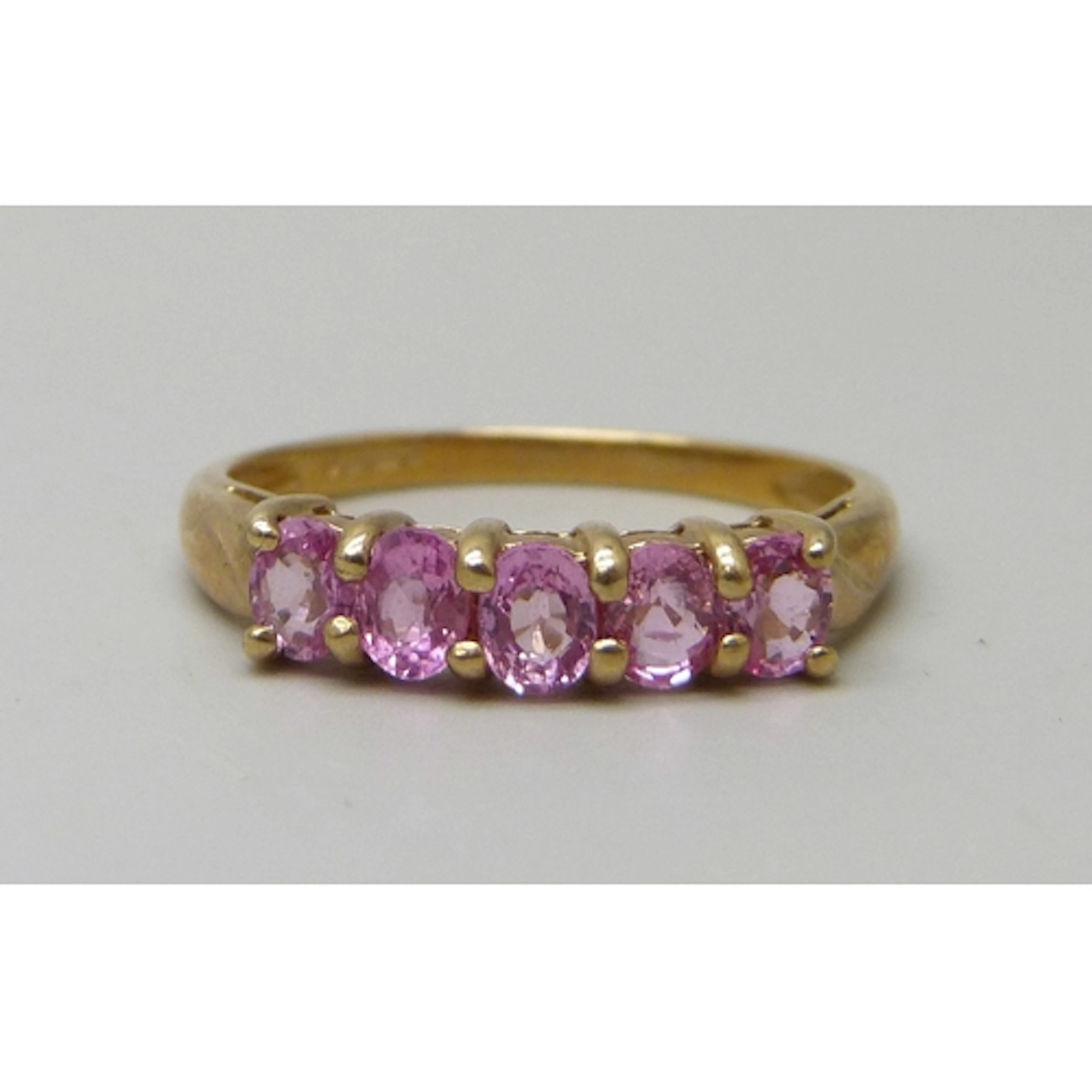 A 9ct gold five stone pink synthetic sapphire ring, 1.8g, P/...