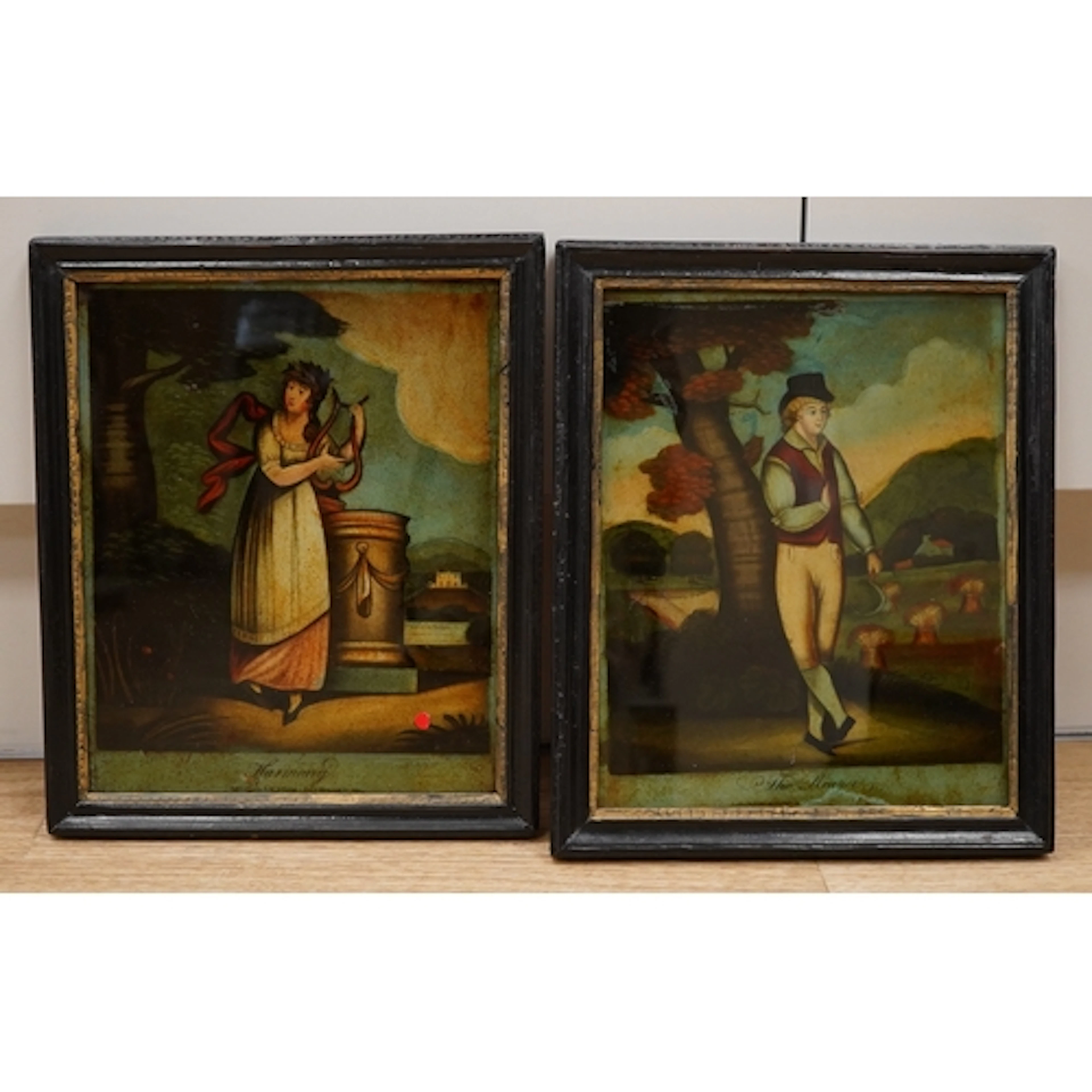 18th century, a pair of reverse glass painted prints 'Harmon...