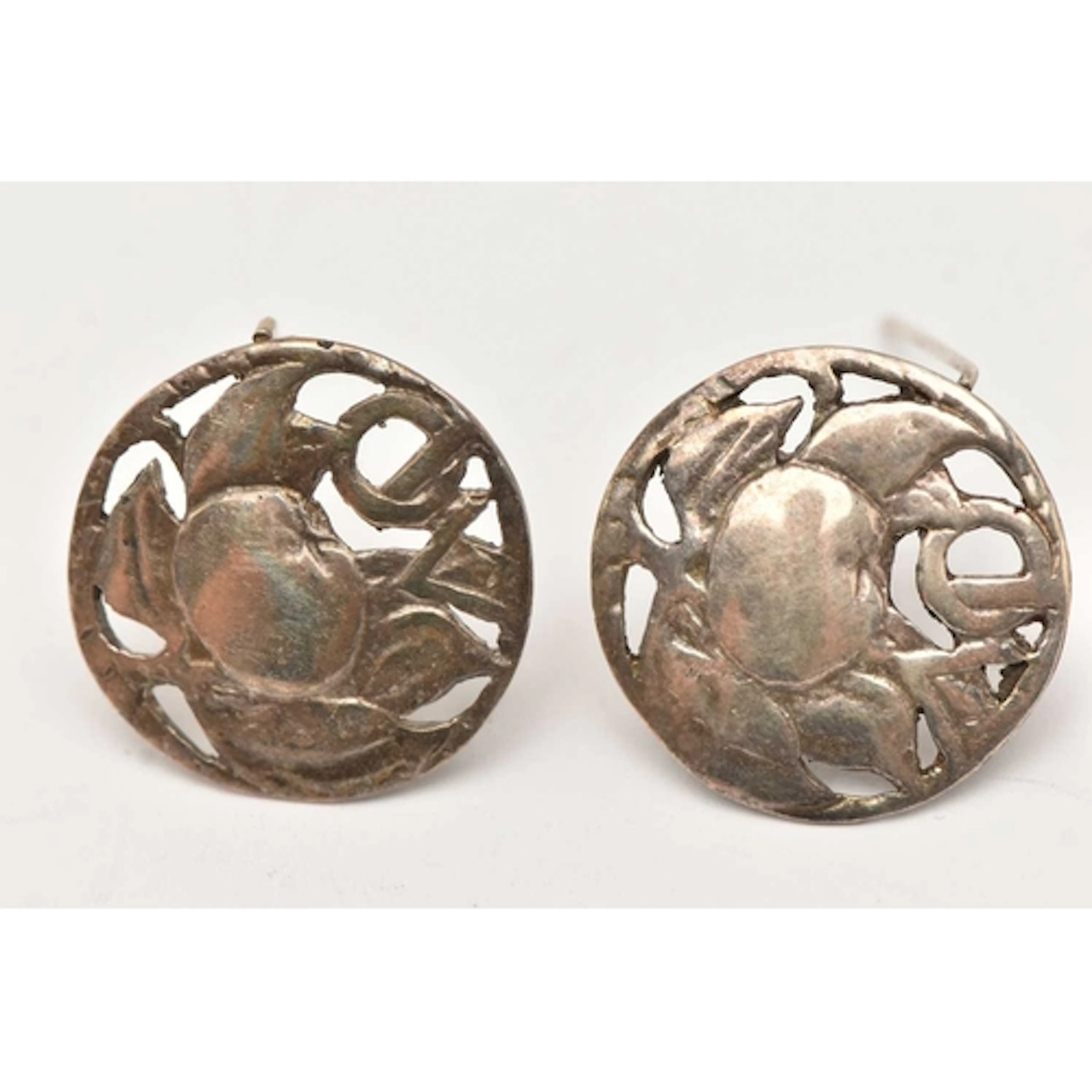 TWO SILVER BROOCHES, both of a circular open work form, fitt...
