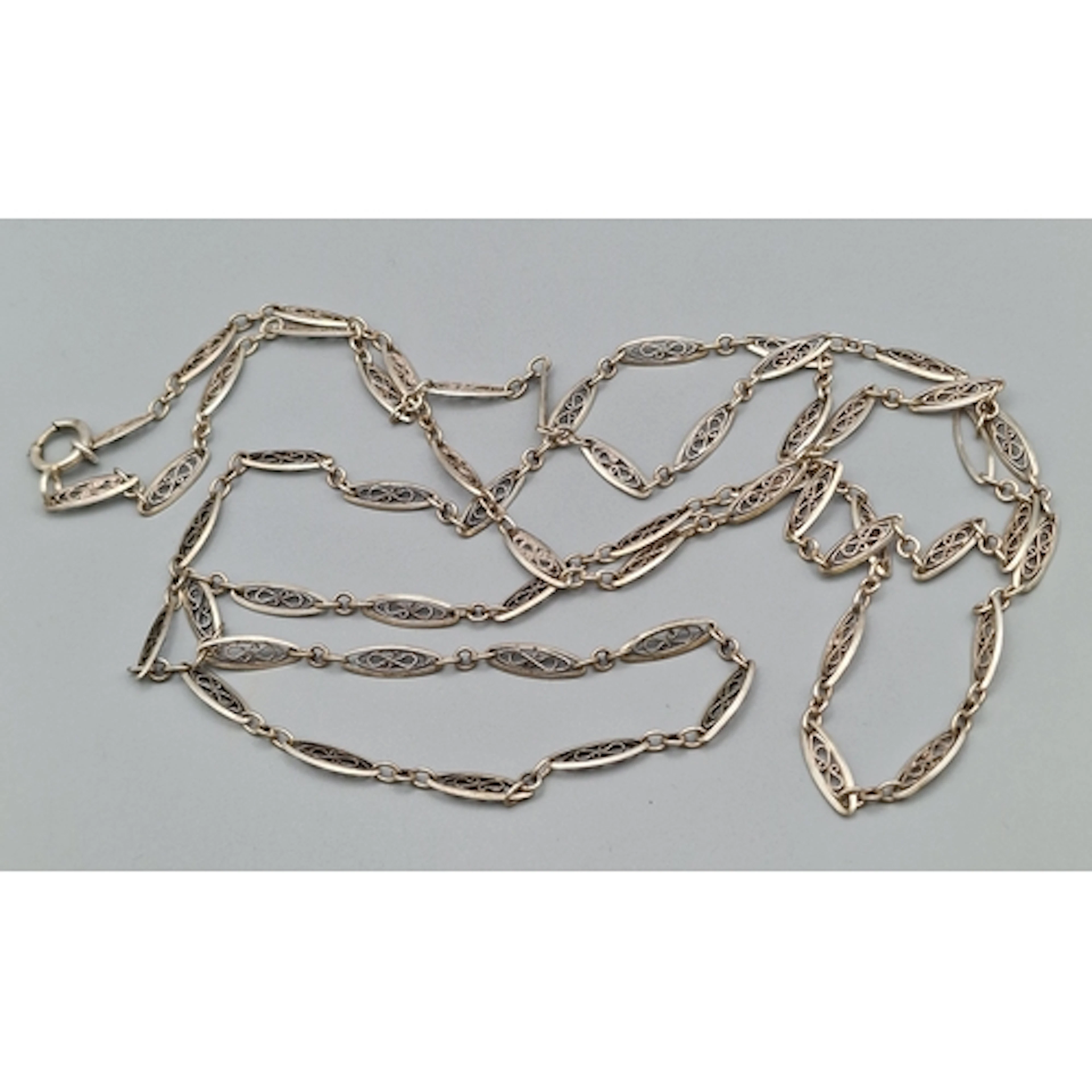 Art Nouveau design 800 silver filigree guard/muff chain. 152...
