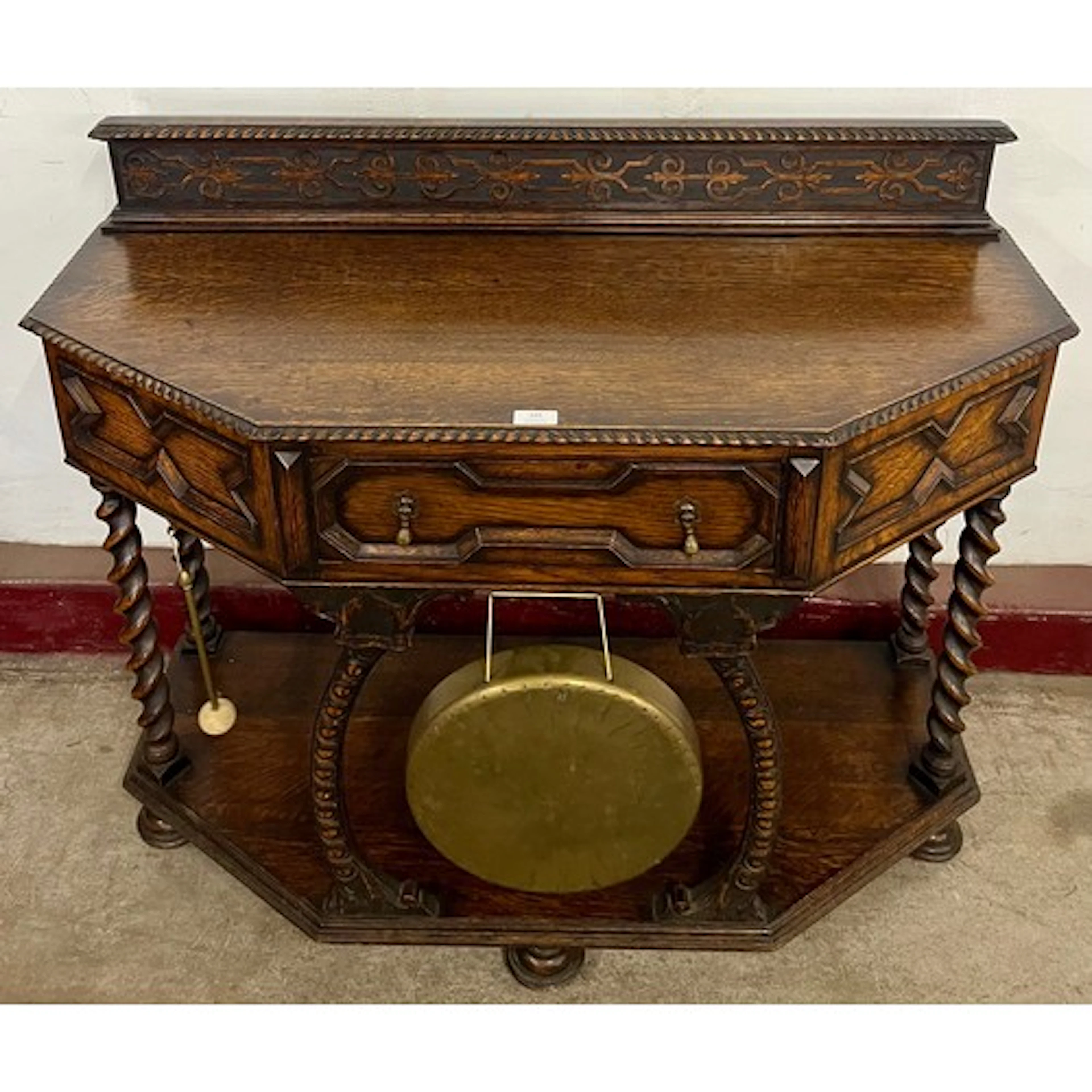 An early 20th Century Jacobean Revival carved oak serving ta...