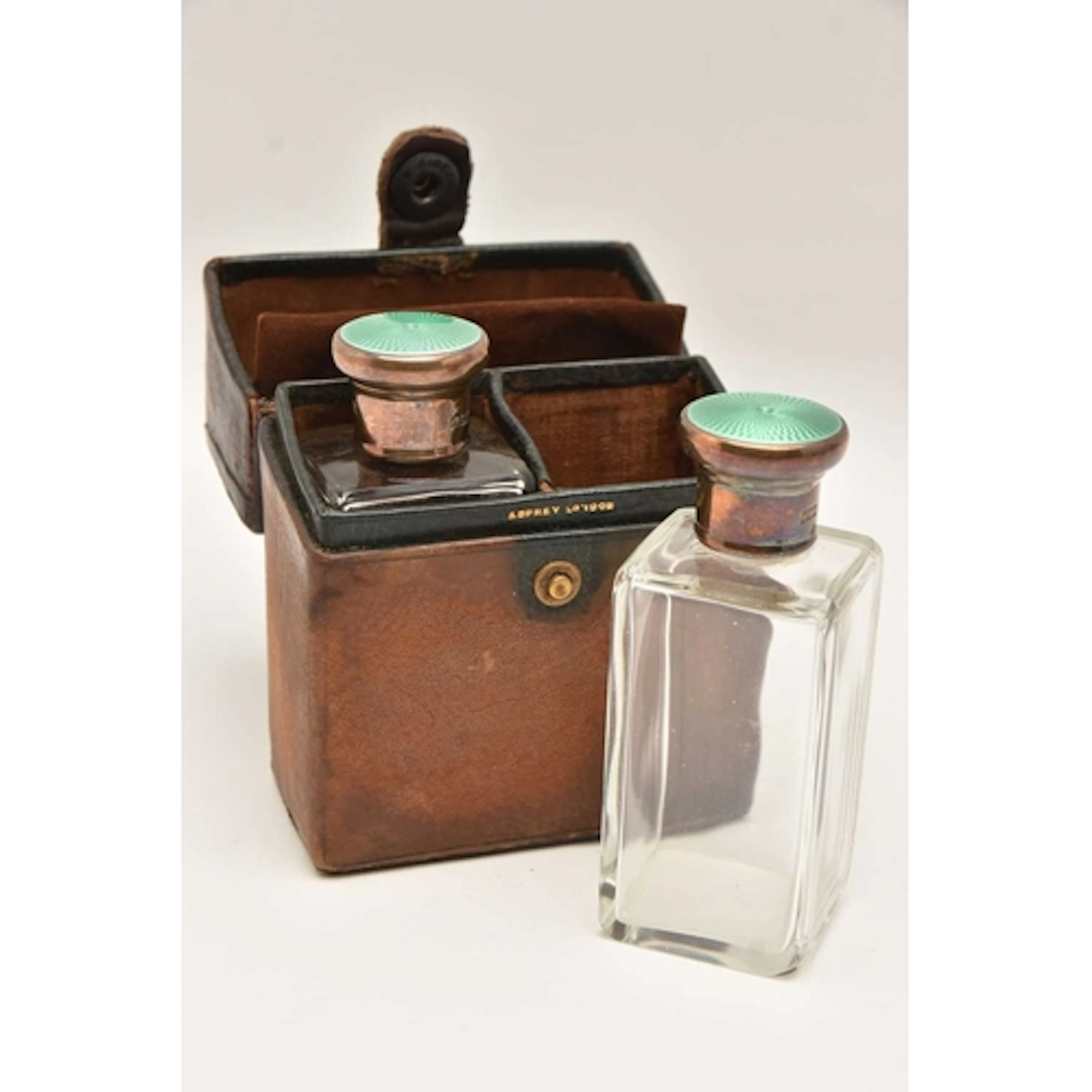 AN EARLY 20TH CENTURY 'ASPREY & CO' TRAVEL PERFUME BOTTL...