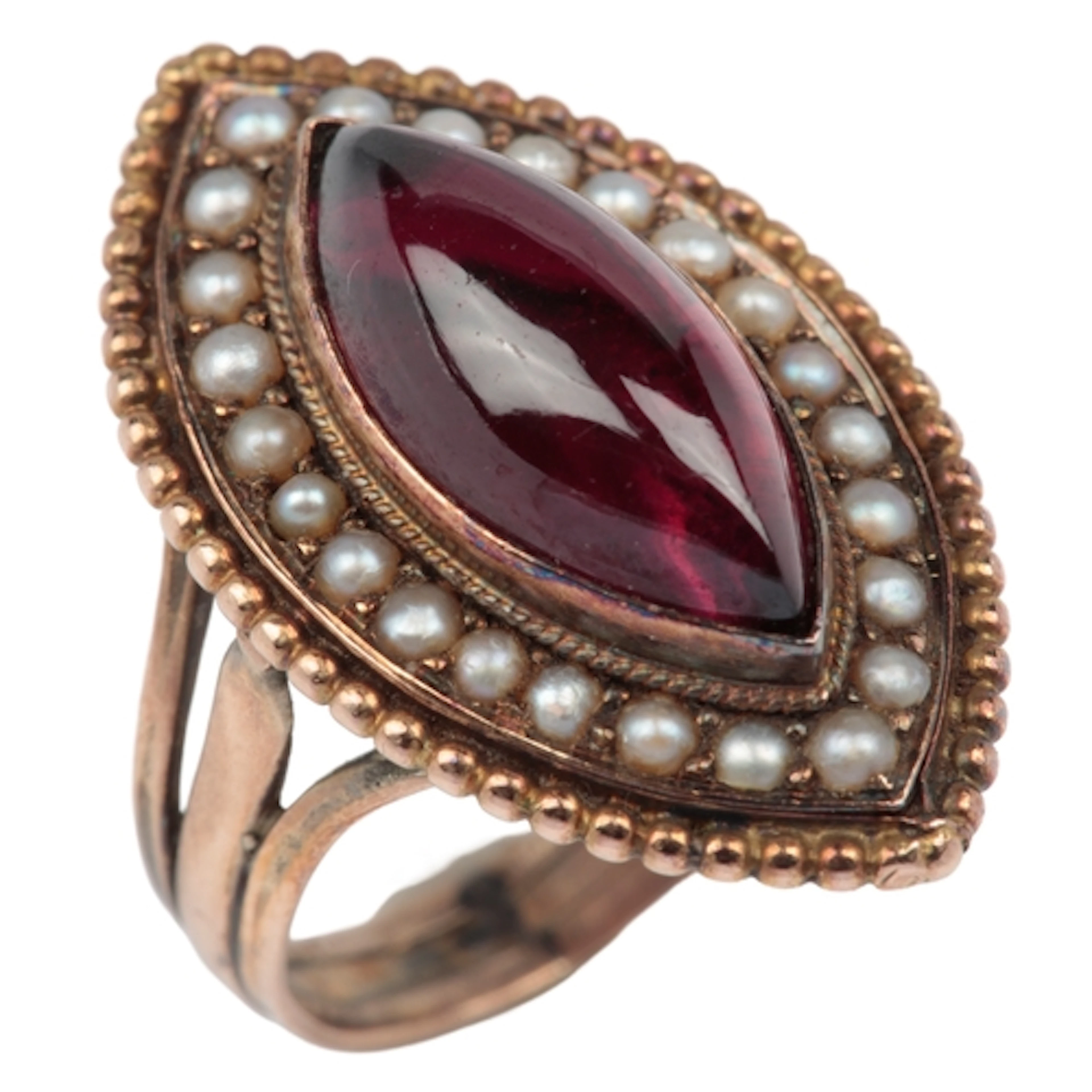 A seed pearl and garnet ring, late 19th century, set with a ...