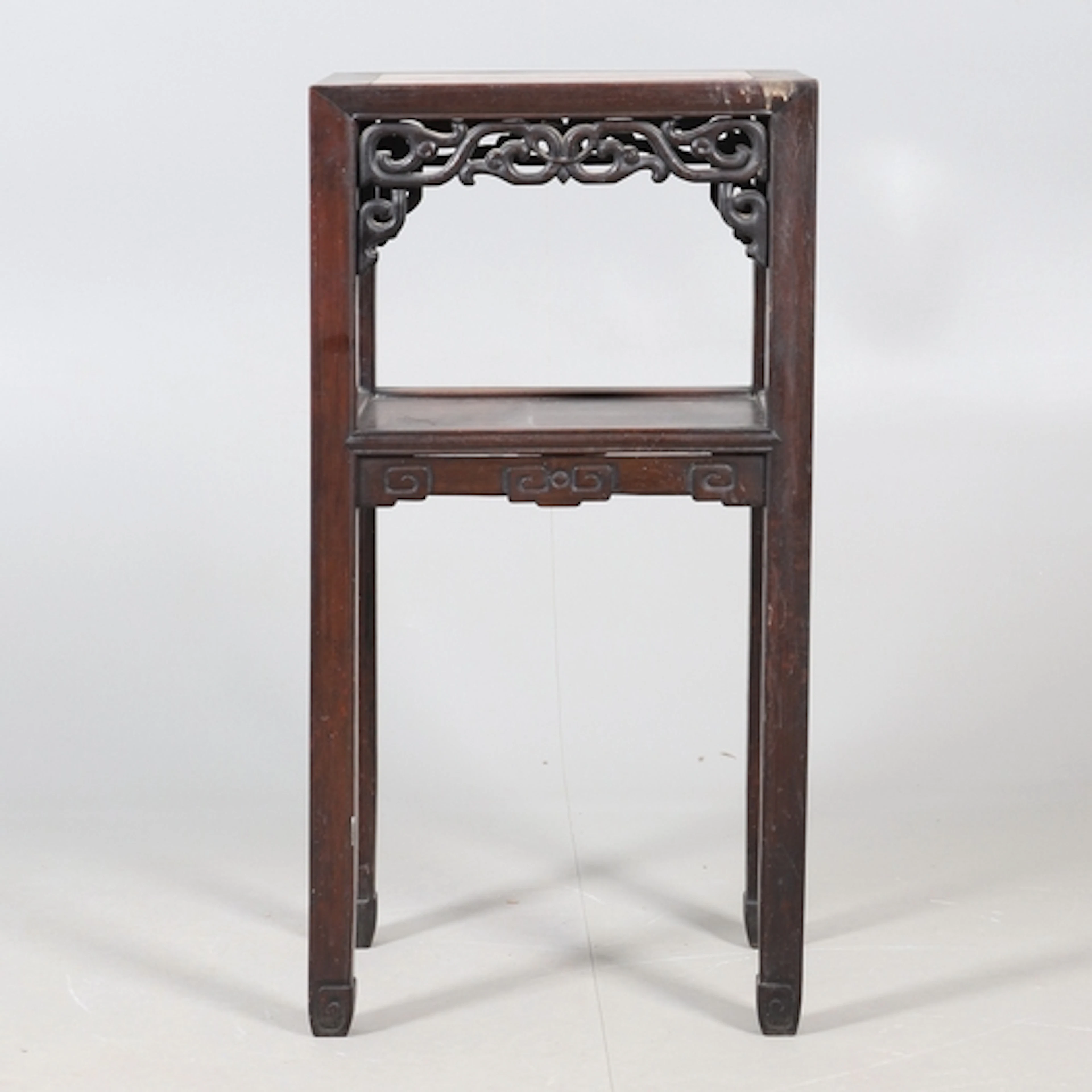 A CHINESE HARDWOOD AND MARBLE TWO TIER JARDINIERE STAND. ear...