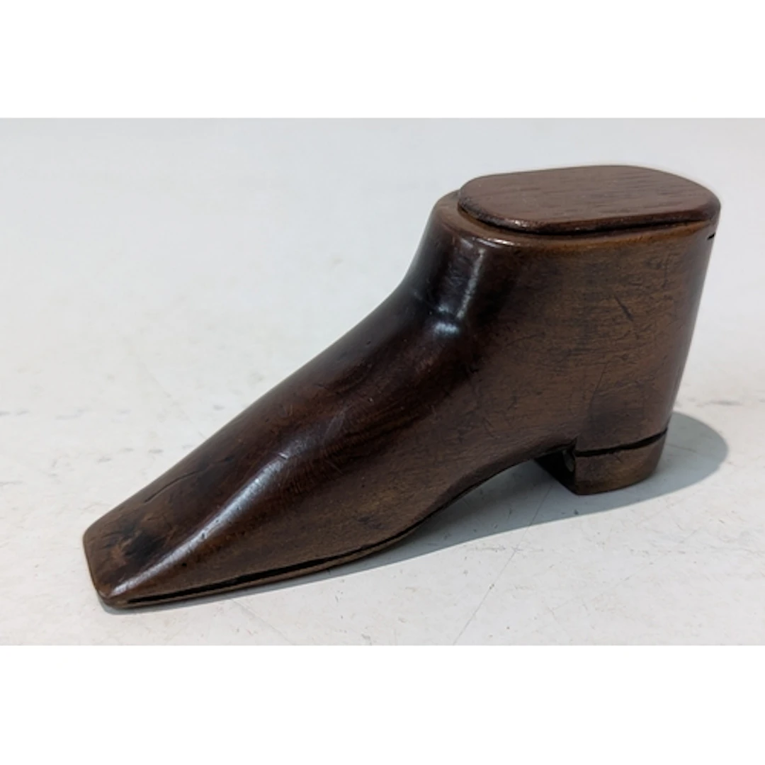 A late 19th/early 20th century snuff box fashioned as a shoe...