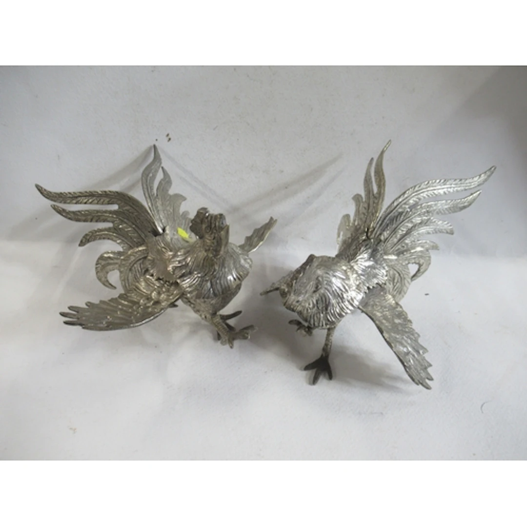 A pair of silver plated cockerel models