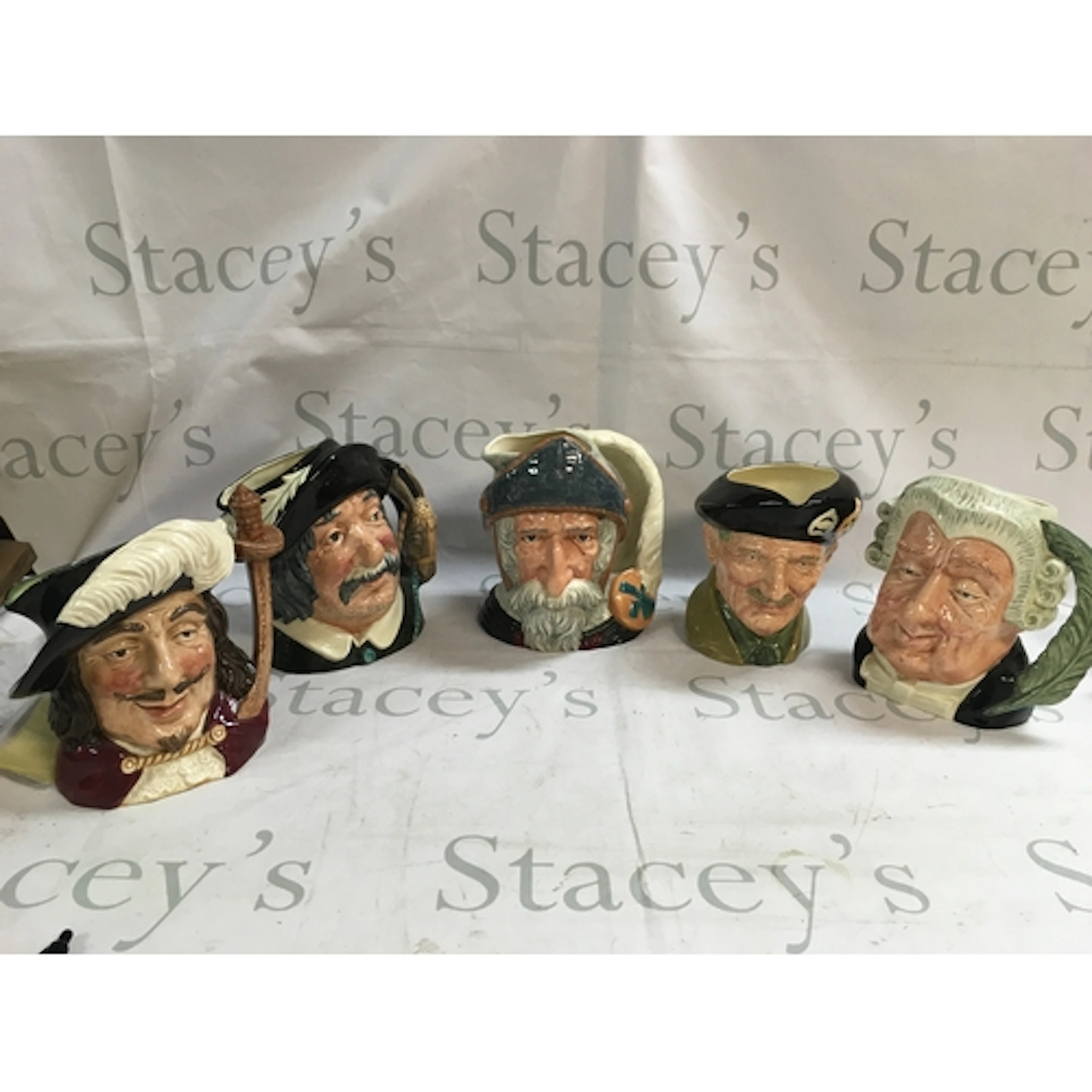 A collection of 5 character jugs including, Porthos, Don Qui...