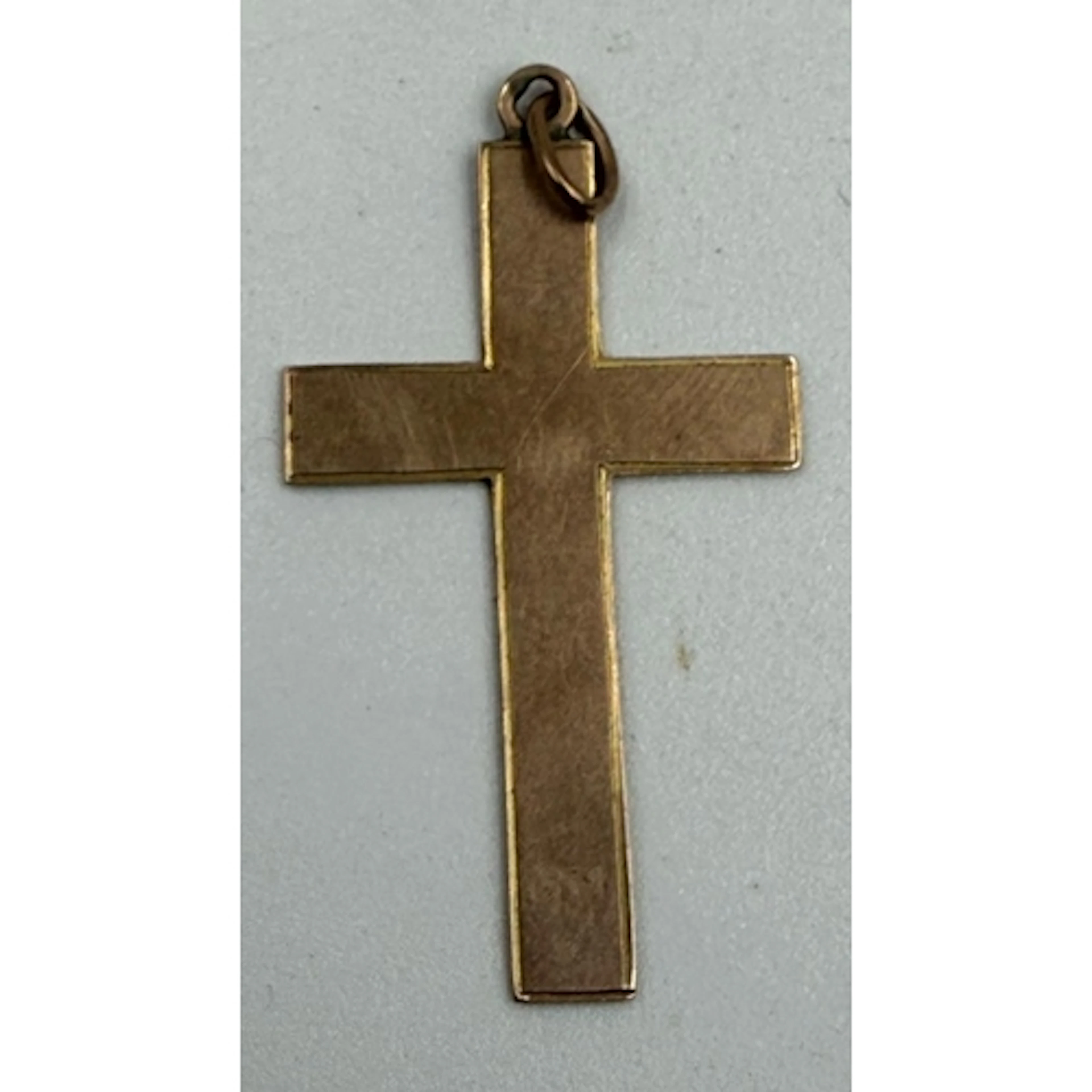 A 9ct gold crucifix. Approximate total weight 2.2g