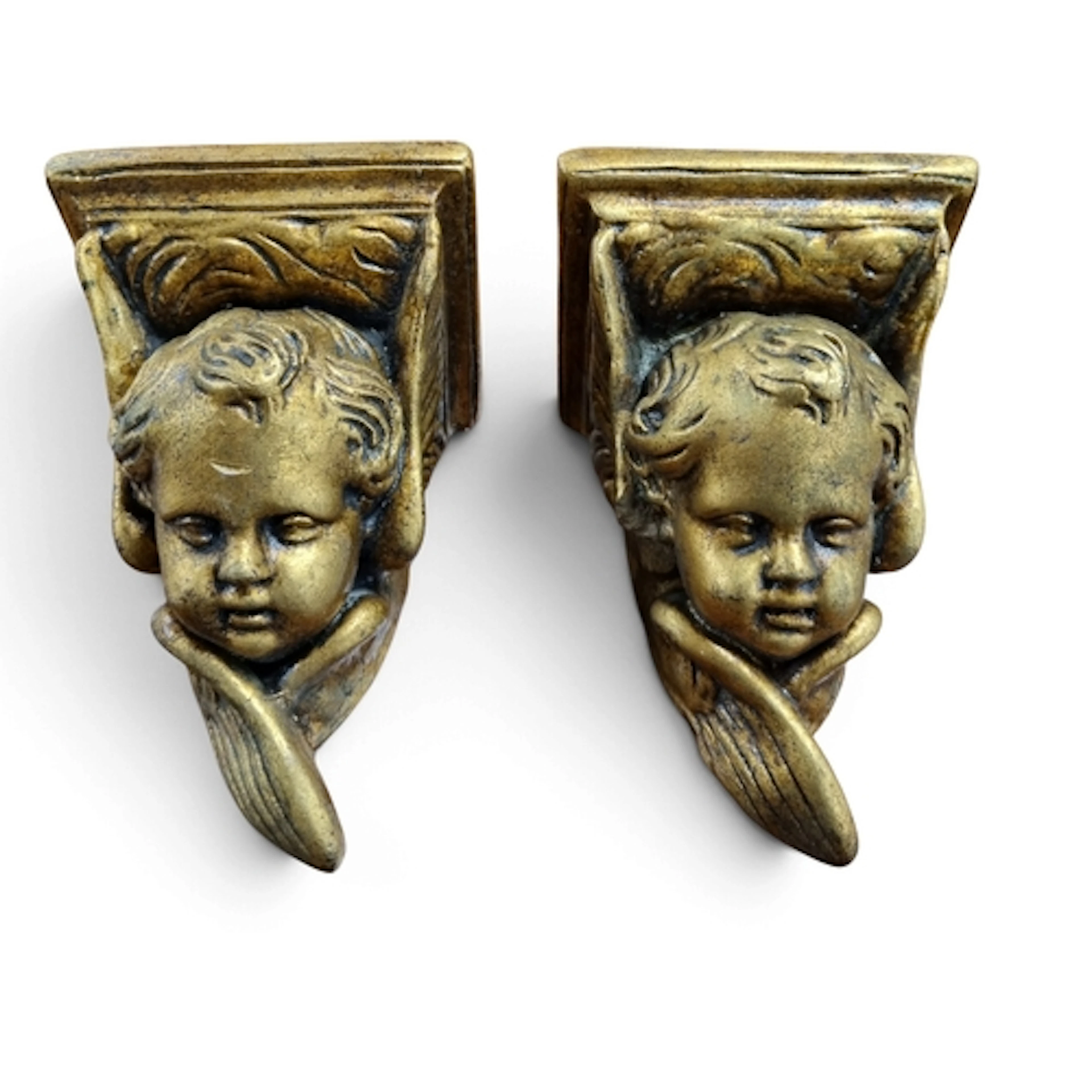 A pair of Cherubs along with two cherub wall pockets. H 25 c...