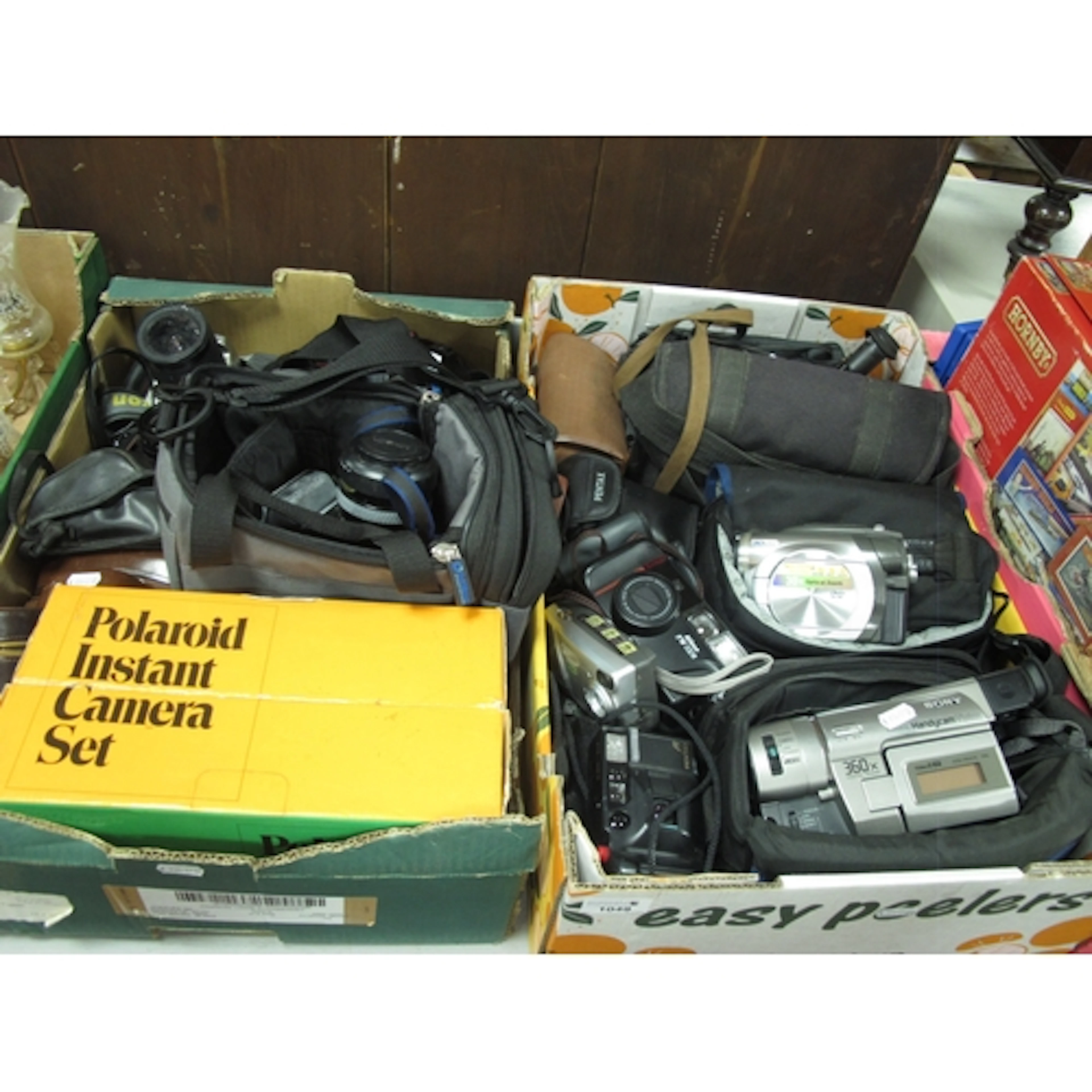 Cameras and camcorders, including SLR cameras (Nikon, Prakti...