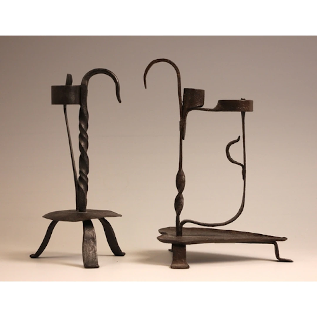 A wrought iron Alpine 'kienspanhalter' pine wood spill and c...