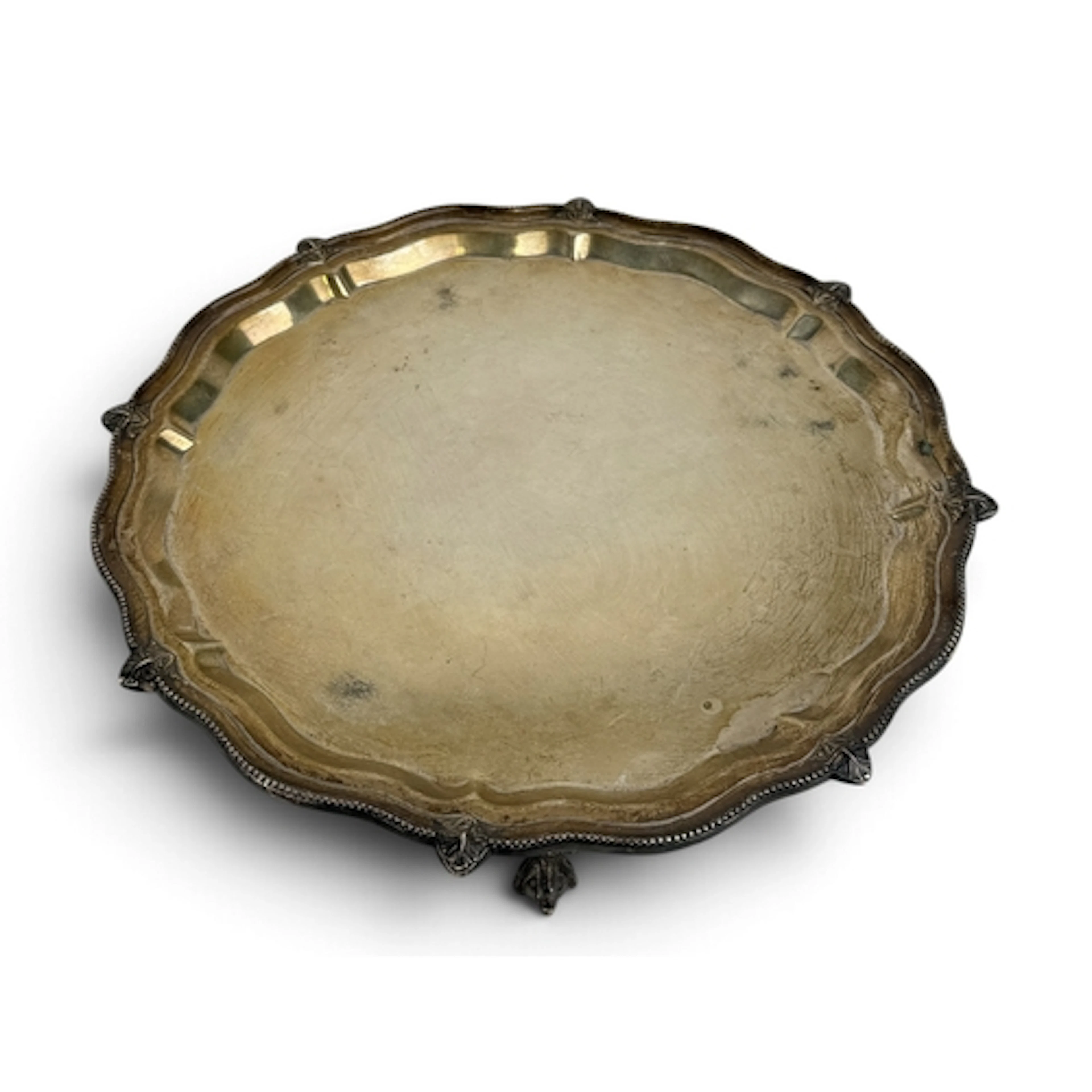 A GEORGE III STYLE SHAPED CIRCULAR SILVER SALVER, S BLACKENS...
