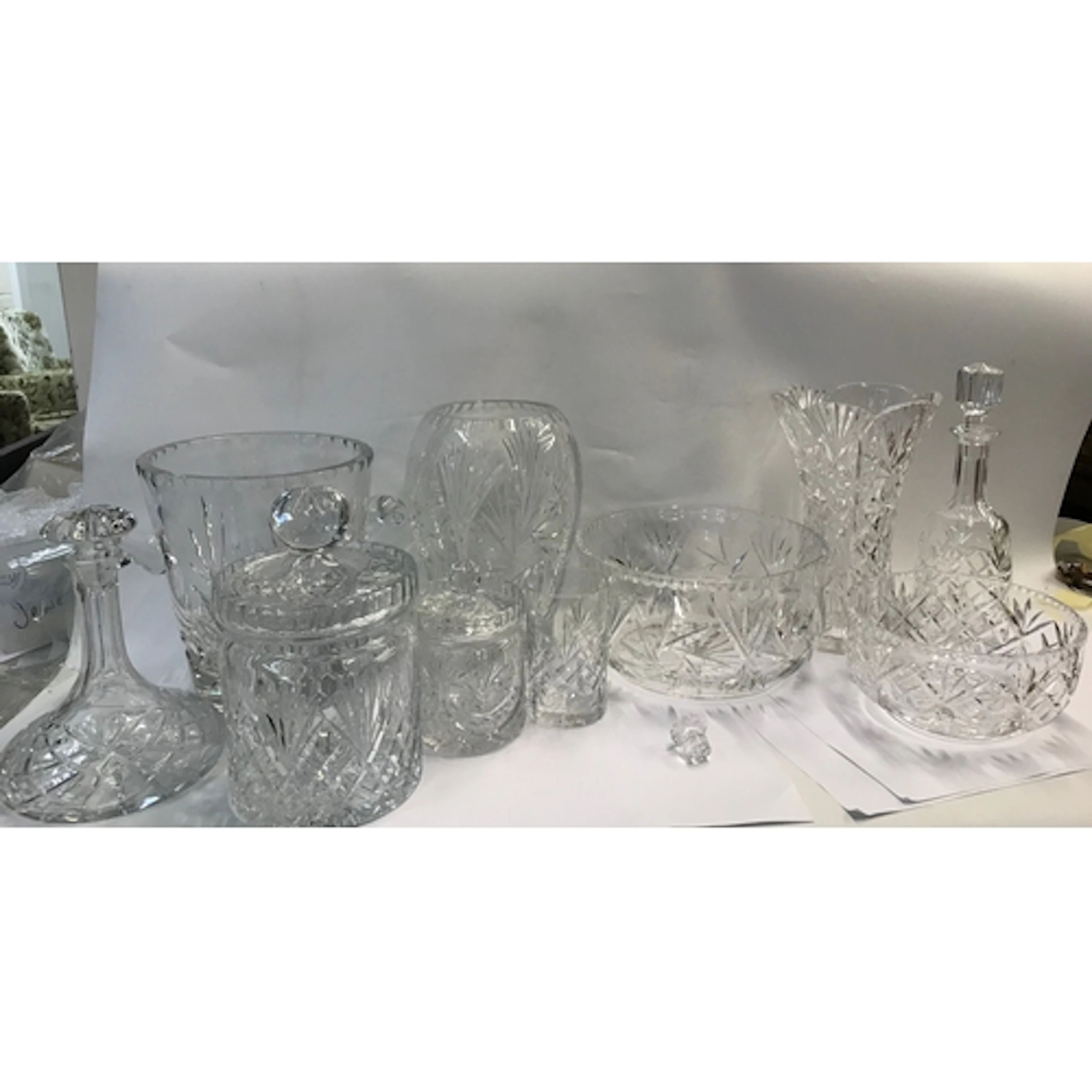 A collection of various cut glass ware including champagne b...