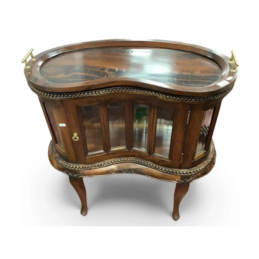 A Later 1960s Hardwood Kidney Shaped Cocktail Cabinet, with ...