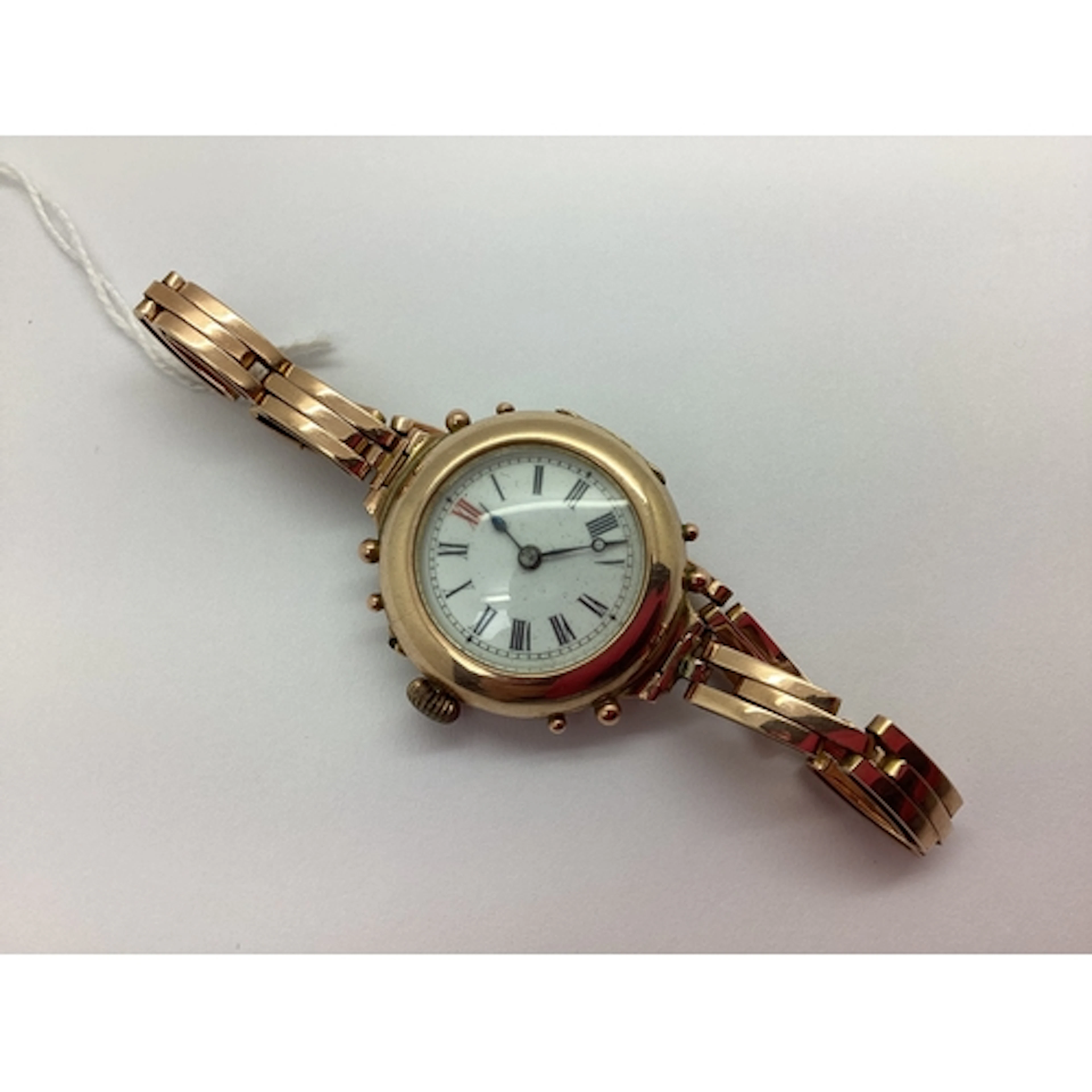 A Decorative Antique Ladies Wristwatch, the white enamel dia...
