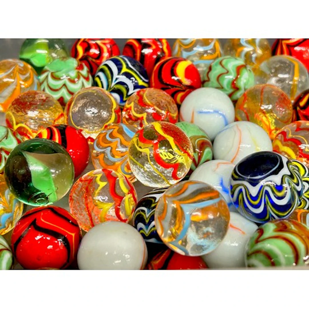 A collection of glass marbles, various coloured swirls and c...