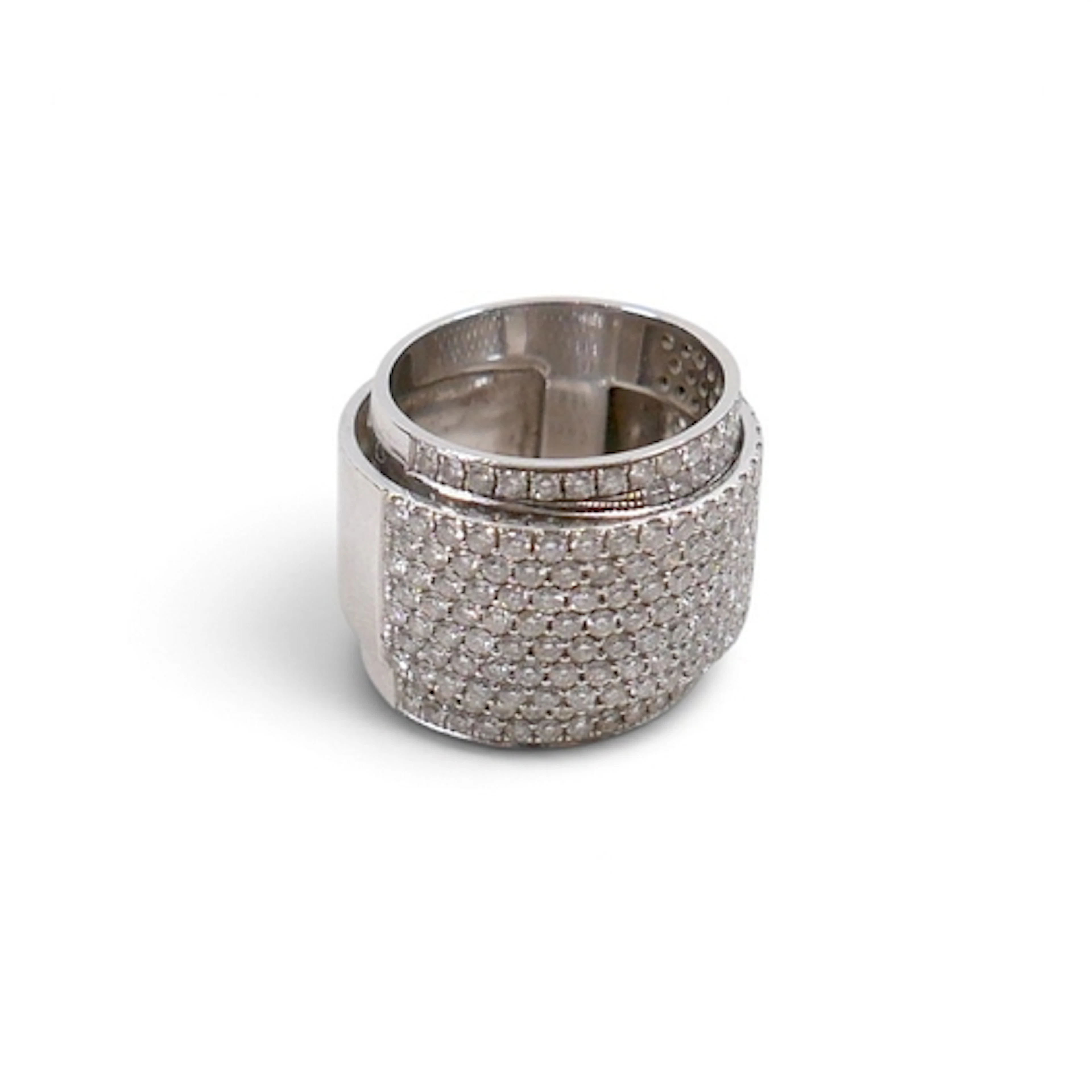 A DESIGNER DIAMOND PAVE SET DOUBLE RING. set in white metal,...