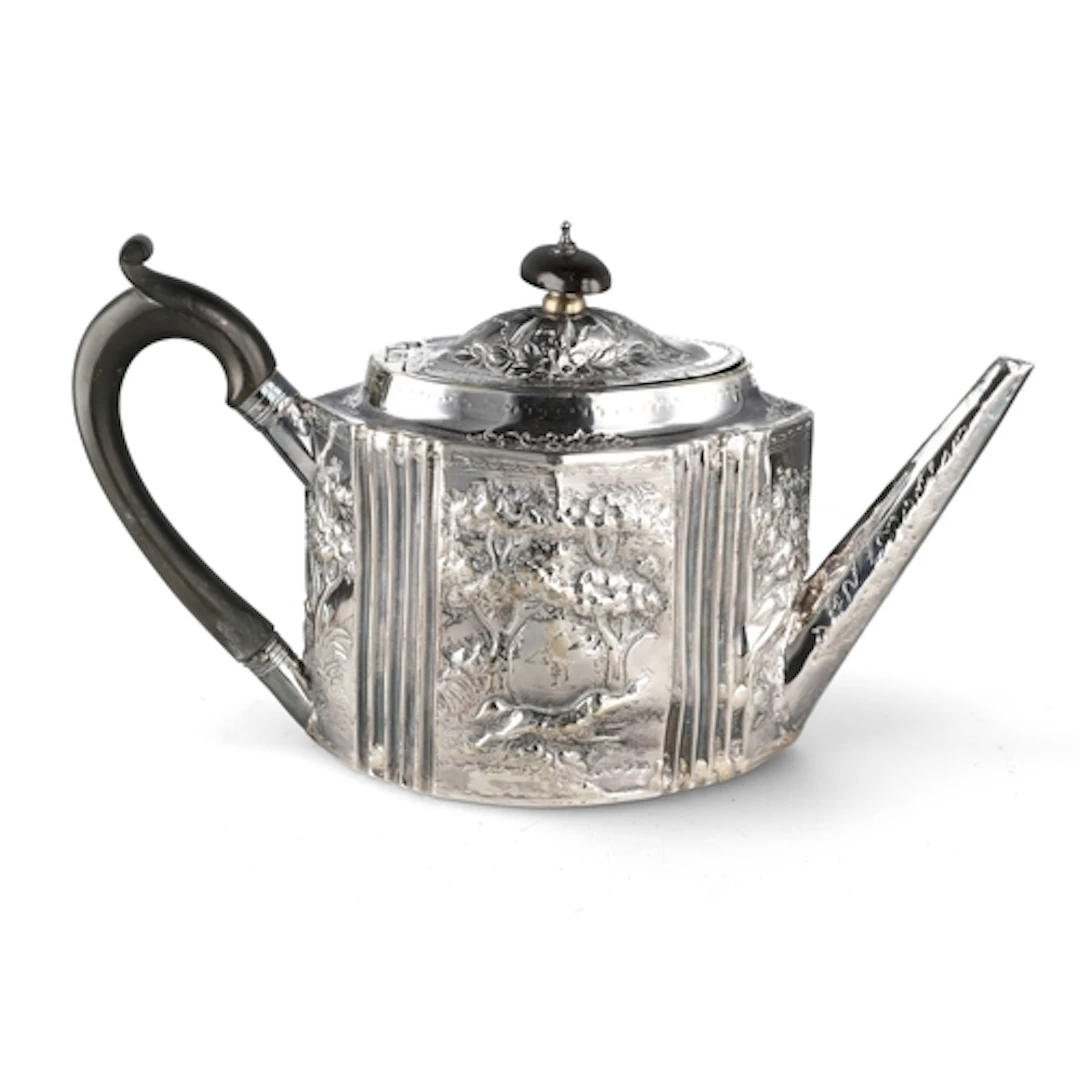 A GEORGE III SILVER NAVETTE SHAPE TEAPOT, HENRY CHAWNER, OND...
