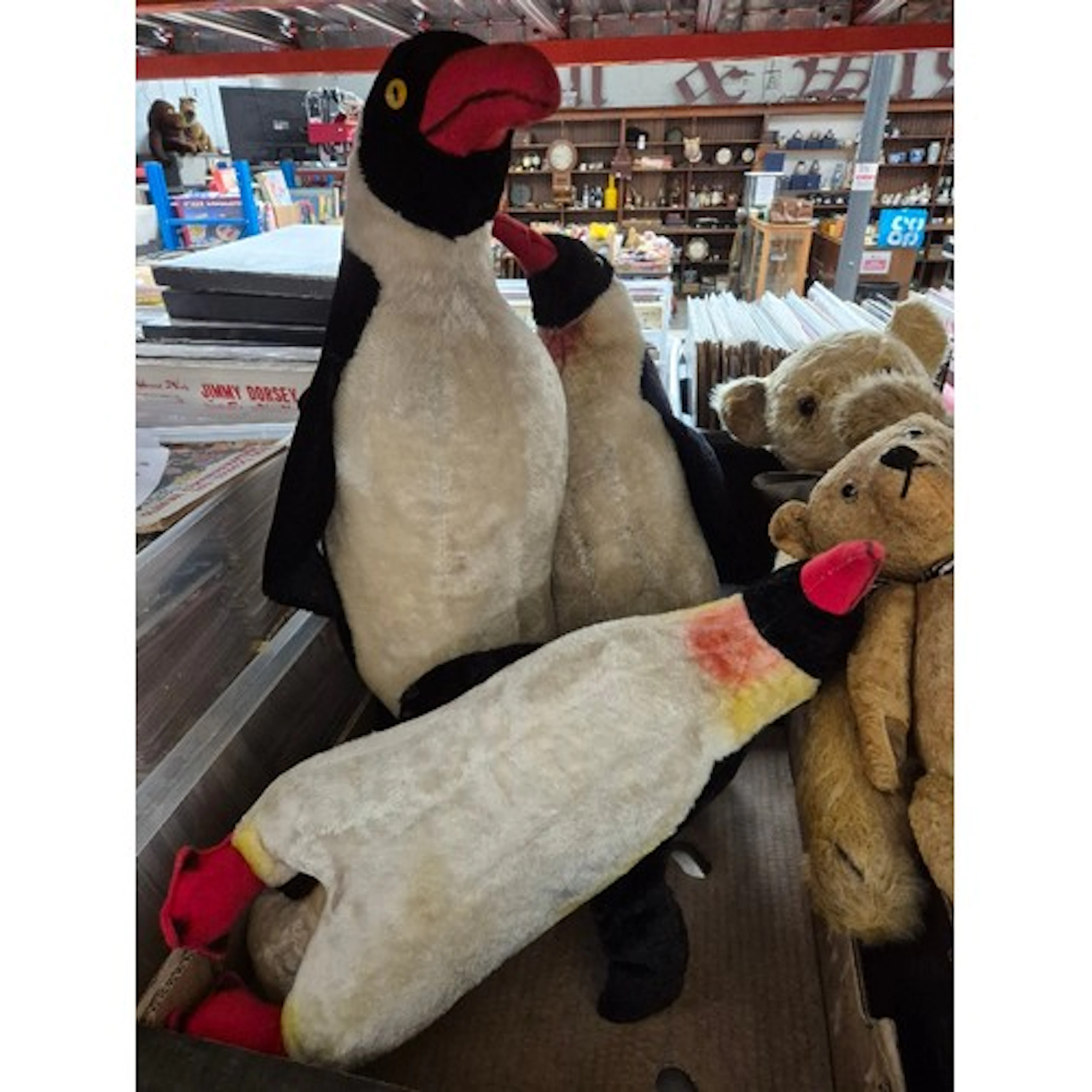 Three vintage penguin soft toys