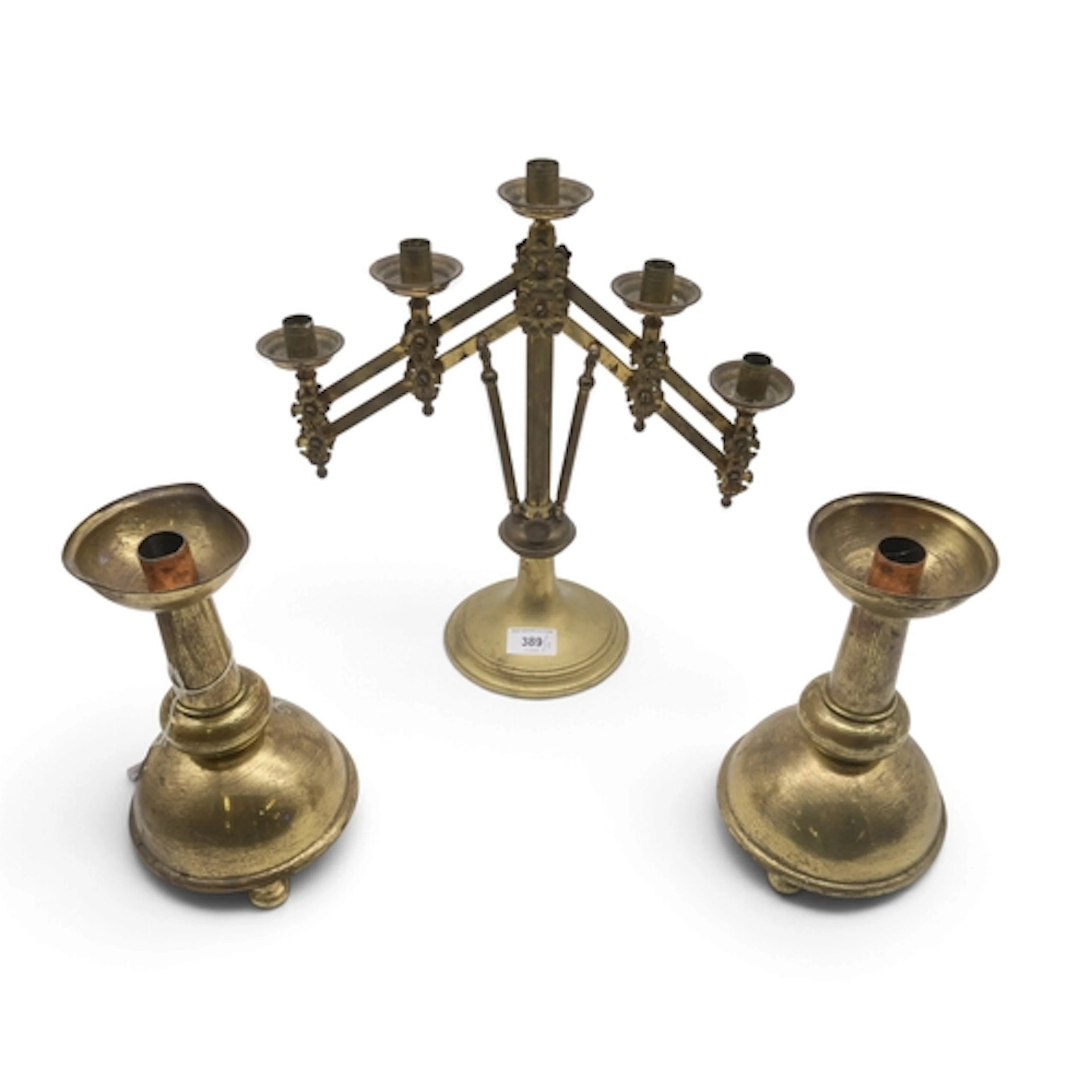A extendable church candelabra with moveable arms, and a pai...