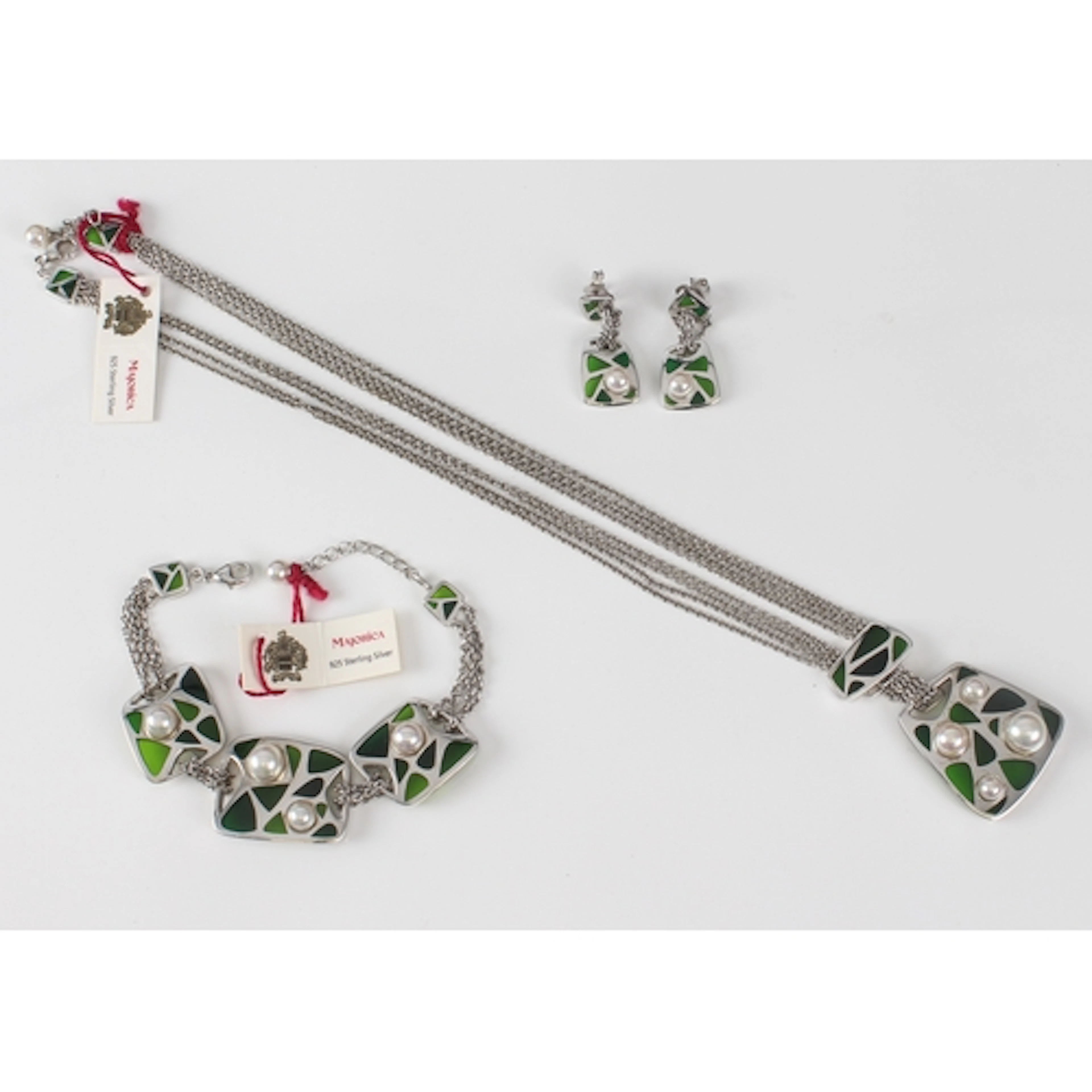 A boxed 925 sterling silver, faux pearl and green glass neck...