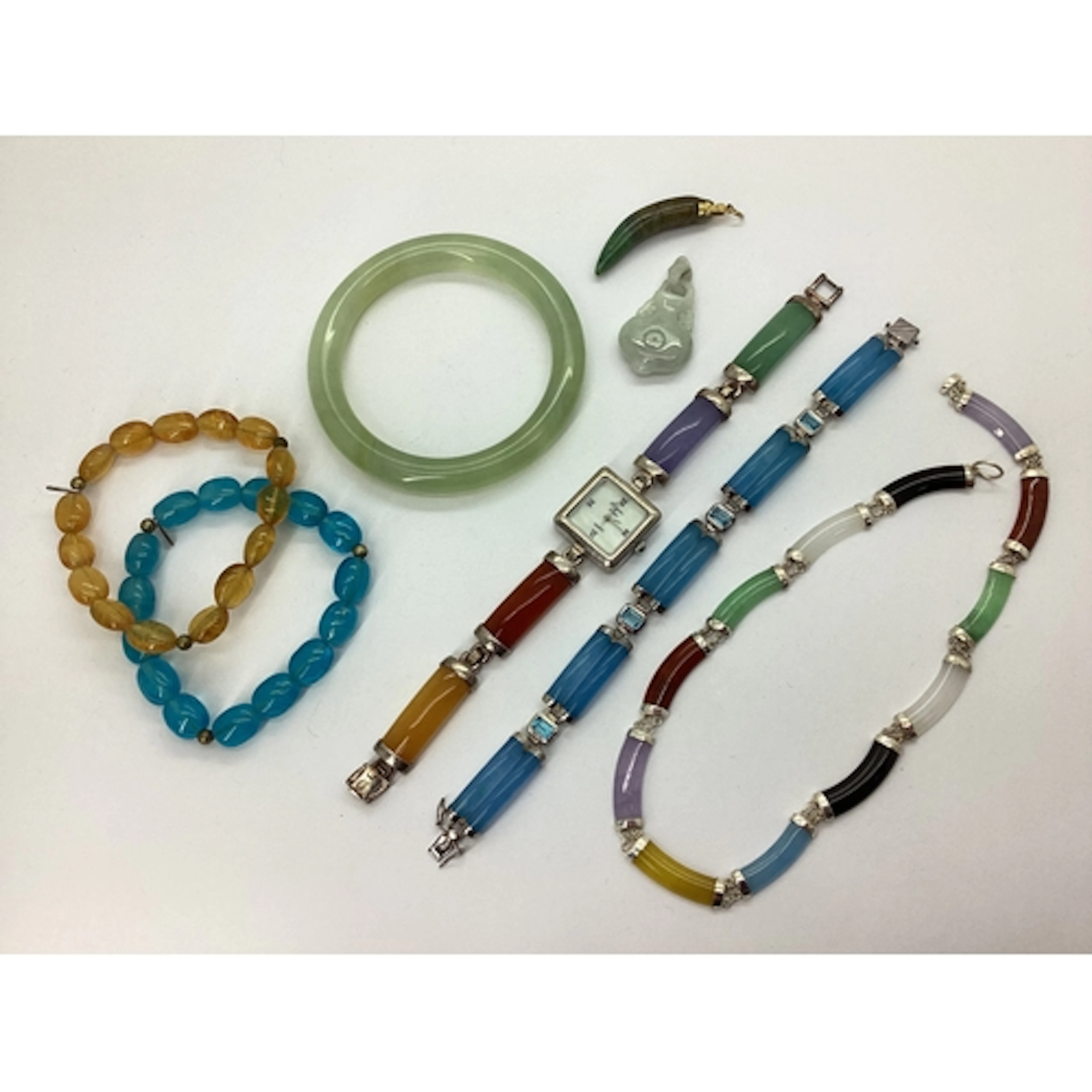 A Collection of Polished Hardstone and Other Jewellery, to i...
