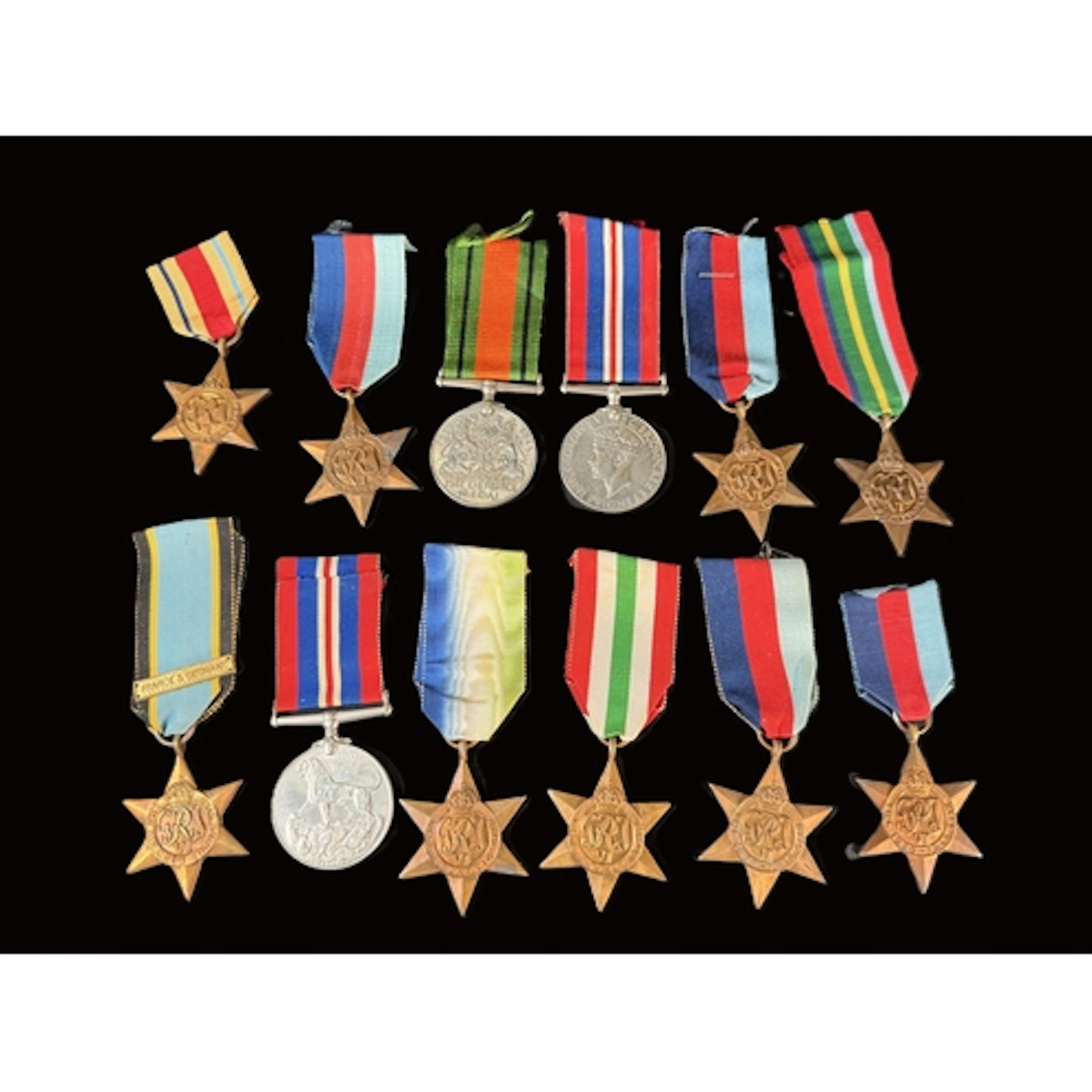 Eleven various WWII medals including Pacific and African Sta...