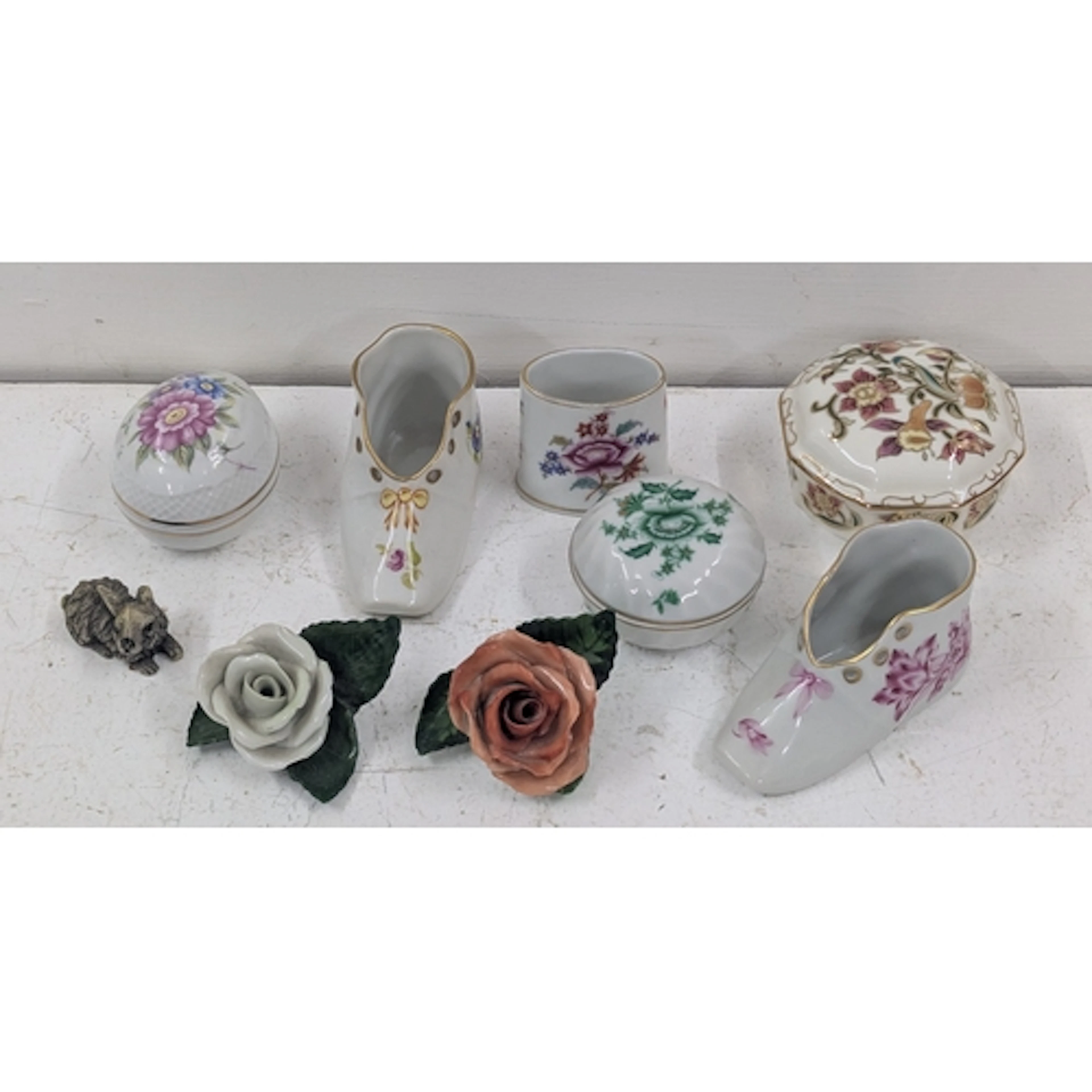 Ceramics to include a Herend model boat, a lidded pot, Zsoln...