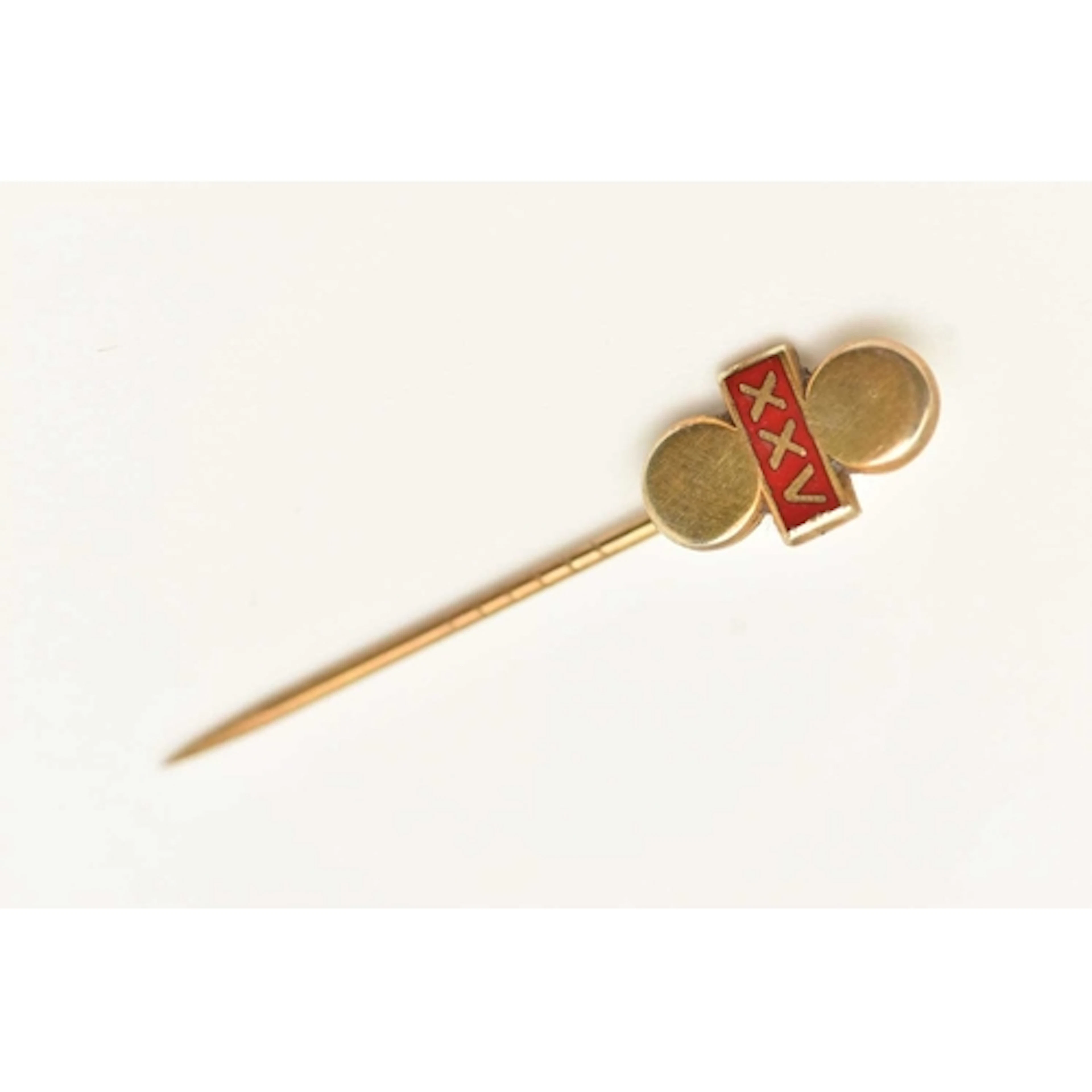 A YELLOW GOLD STICK PIN, with red enamel detail, Roman numer...
