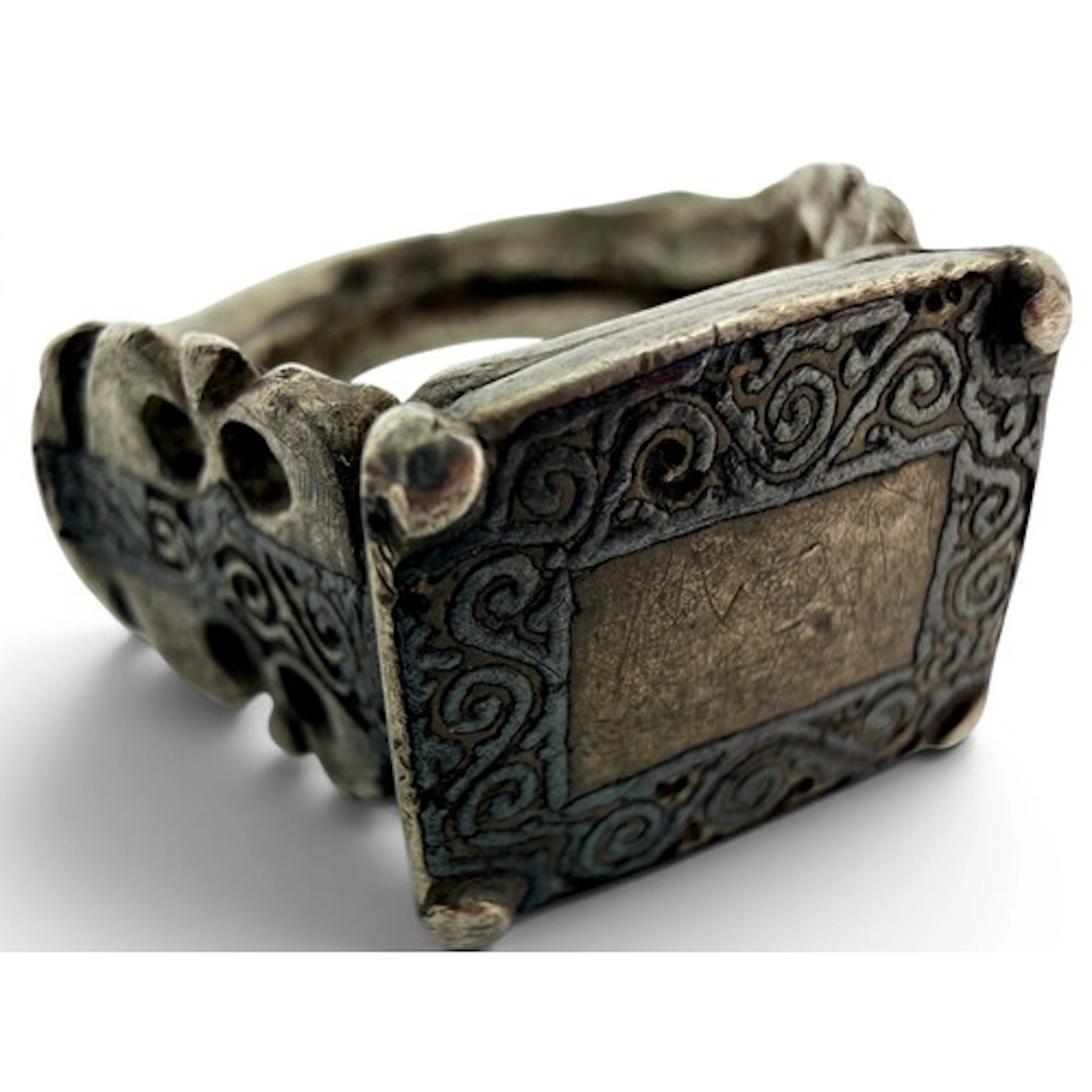 A Seljuk/Seljuq silver and niello ring, with a flat bezel fr...