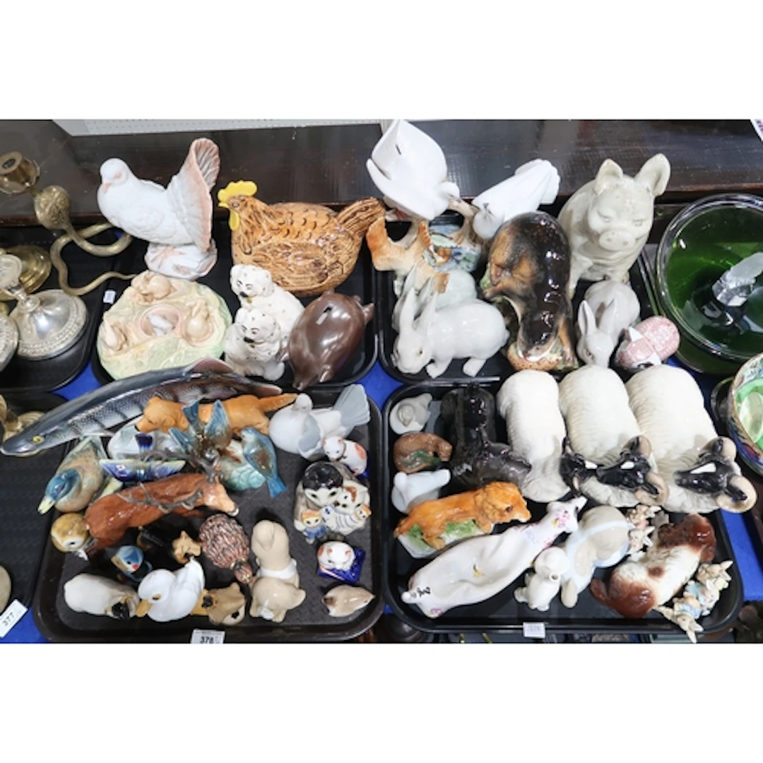 A collection of animal and bird figures