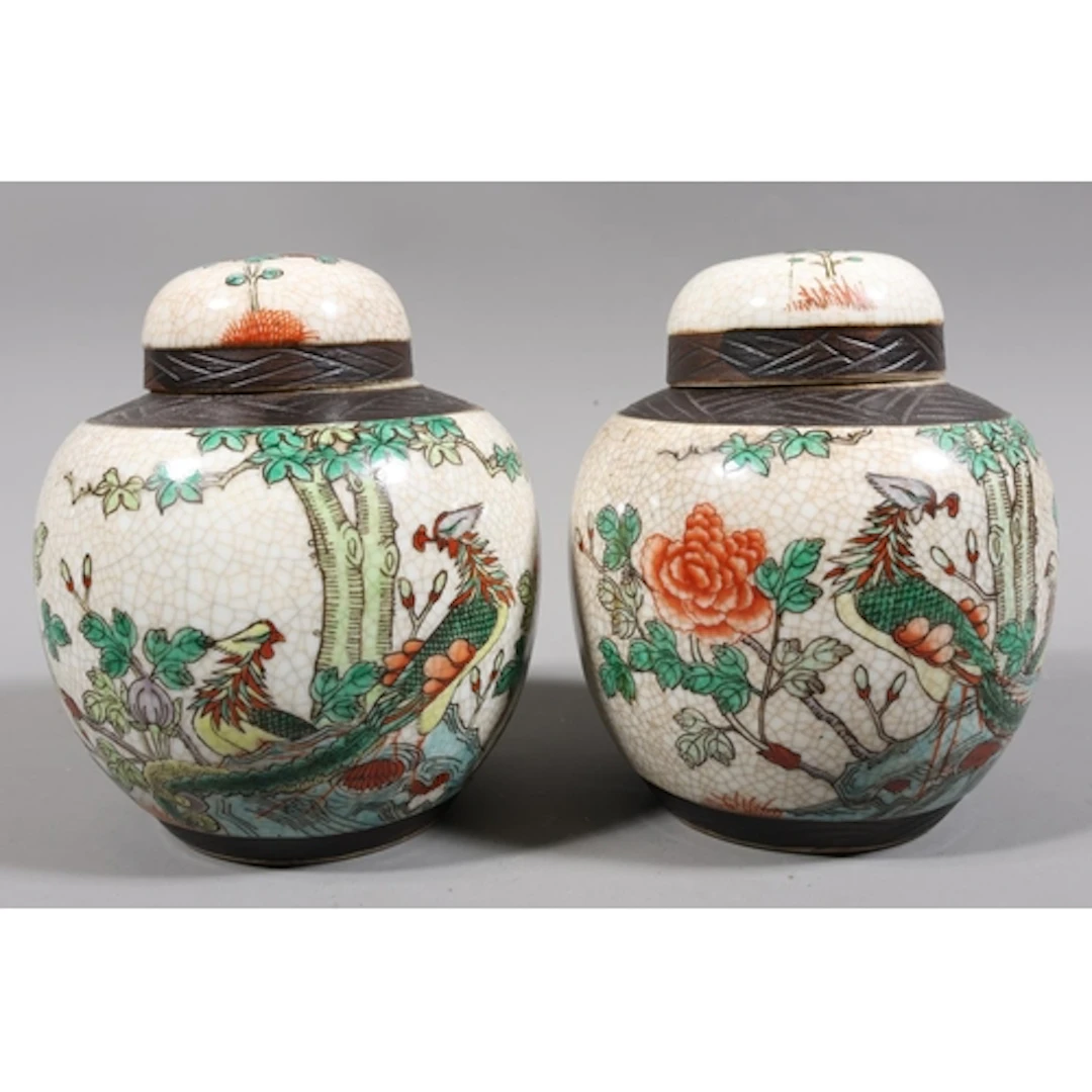Pair of crackle glazed ginger jars and covers decorated with...