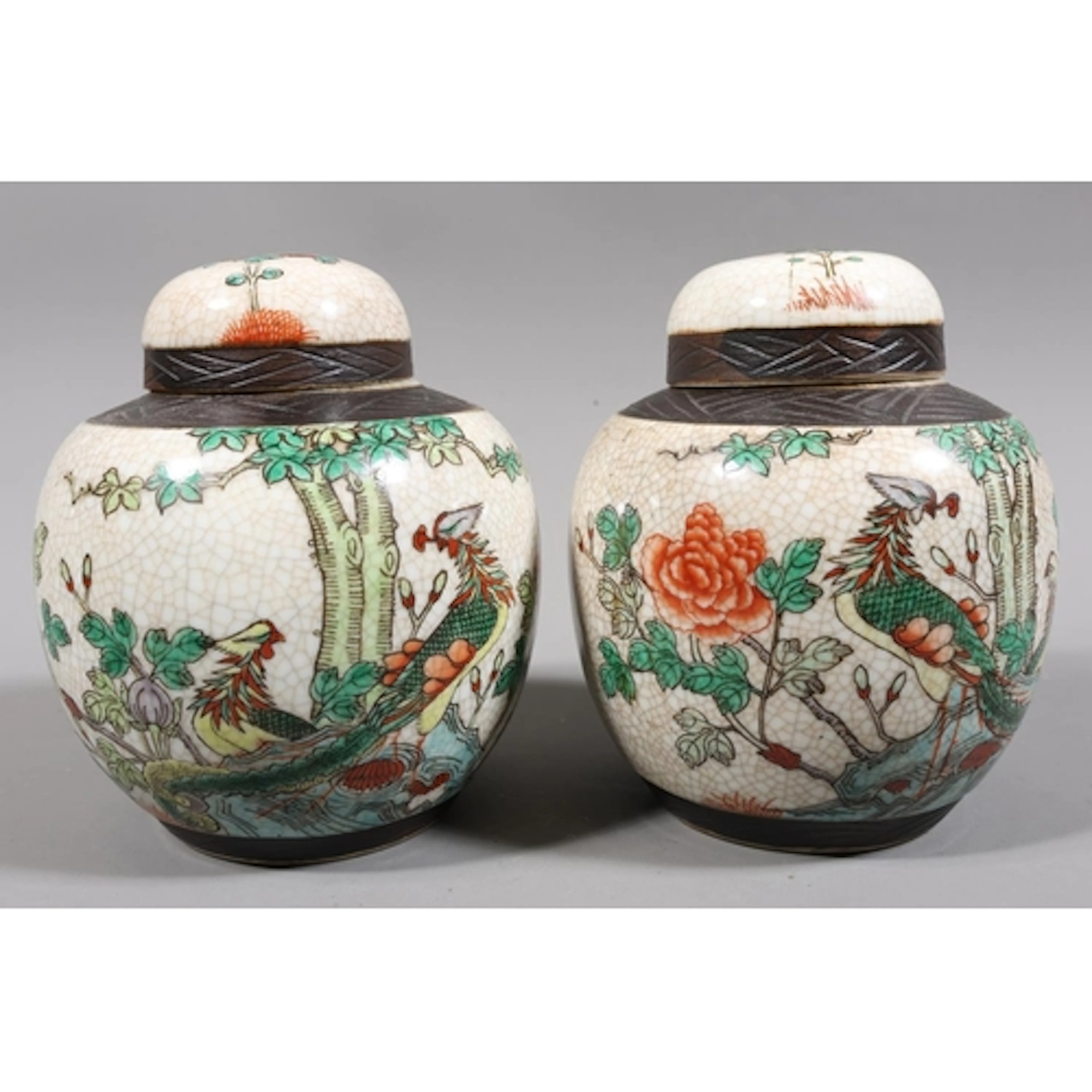 Pair of crackle glazed ginger jars and covers decorated with...