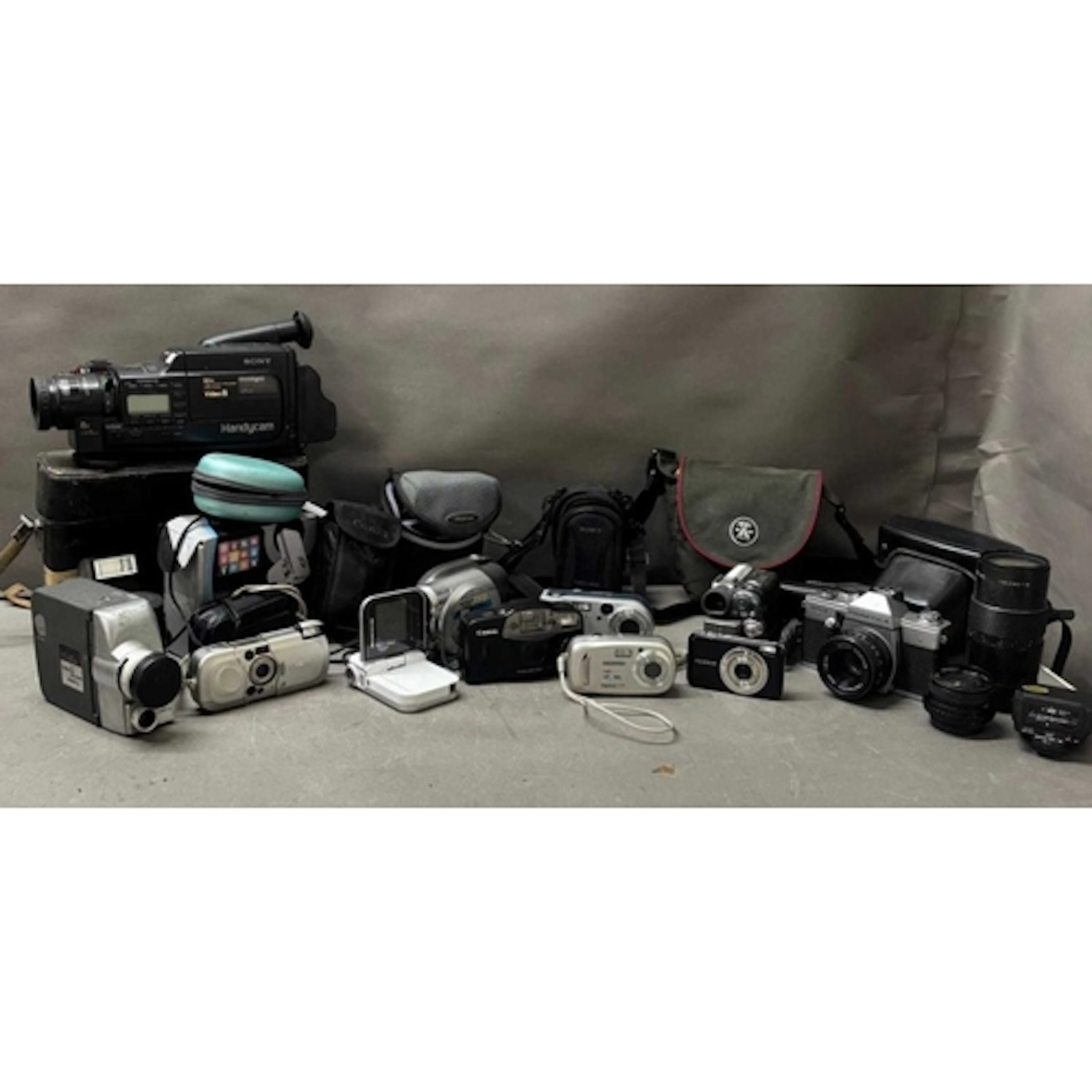 A arge collection of cameras and video equipment to include ...