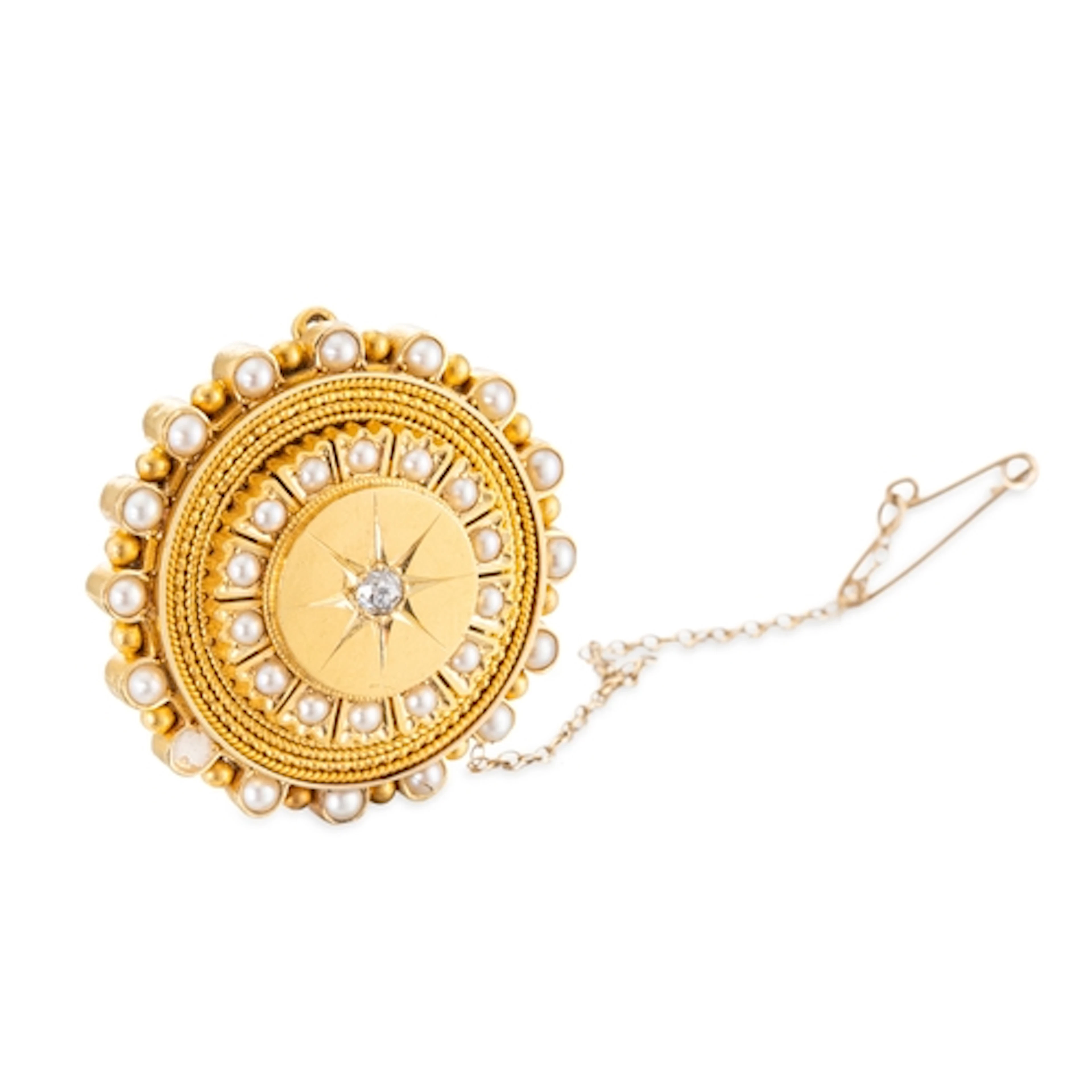 AN ANTIQUE GOLD CIRCULAR BROOCH, set with an old cut diamond...