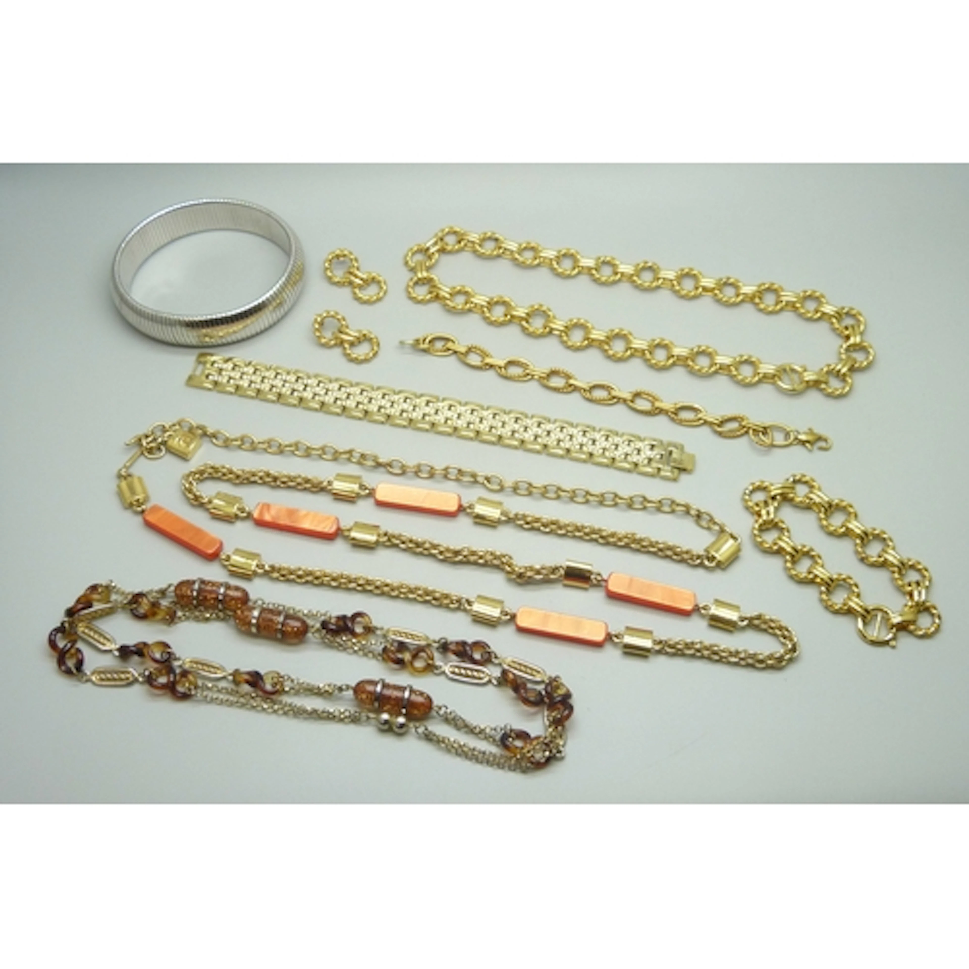 A collection of vintage costume jewellery including a Coro a...
