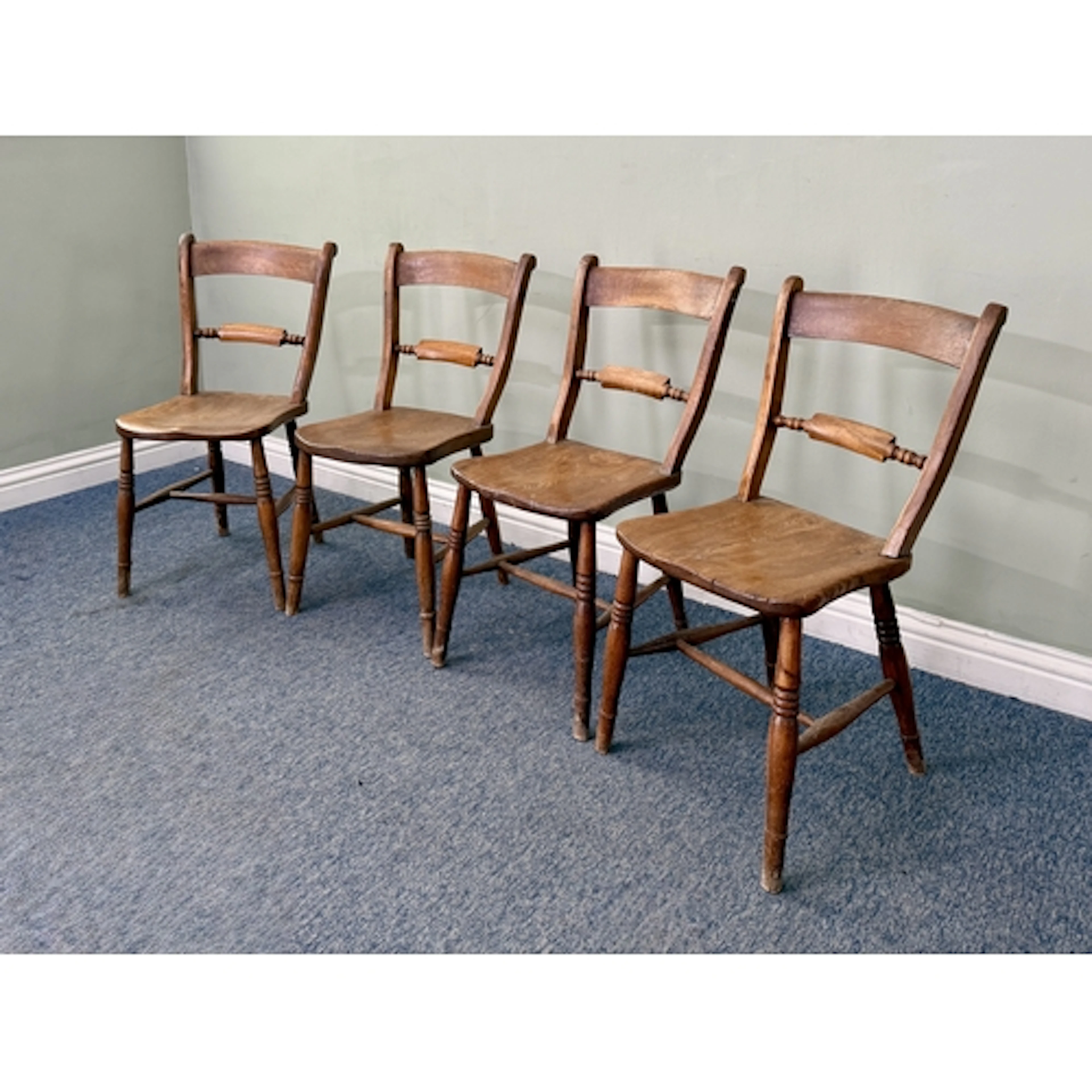 A closely matched pair of mid-19th century scroll back Winds...
