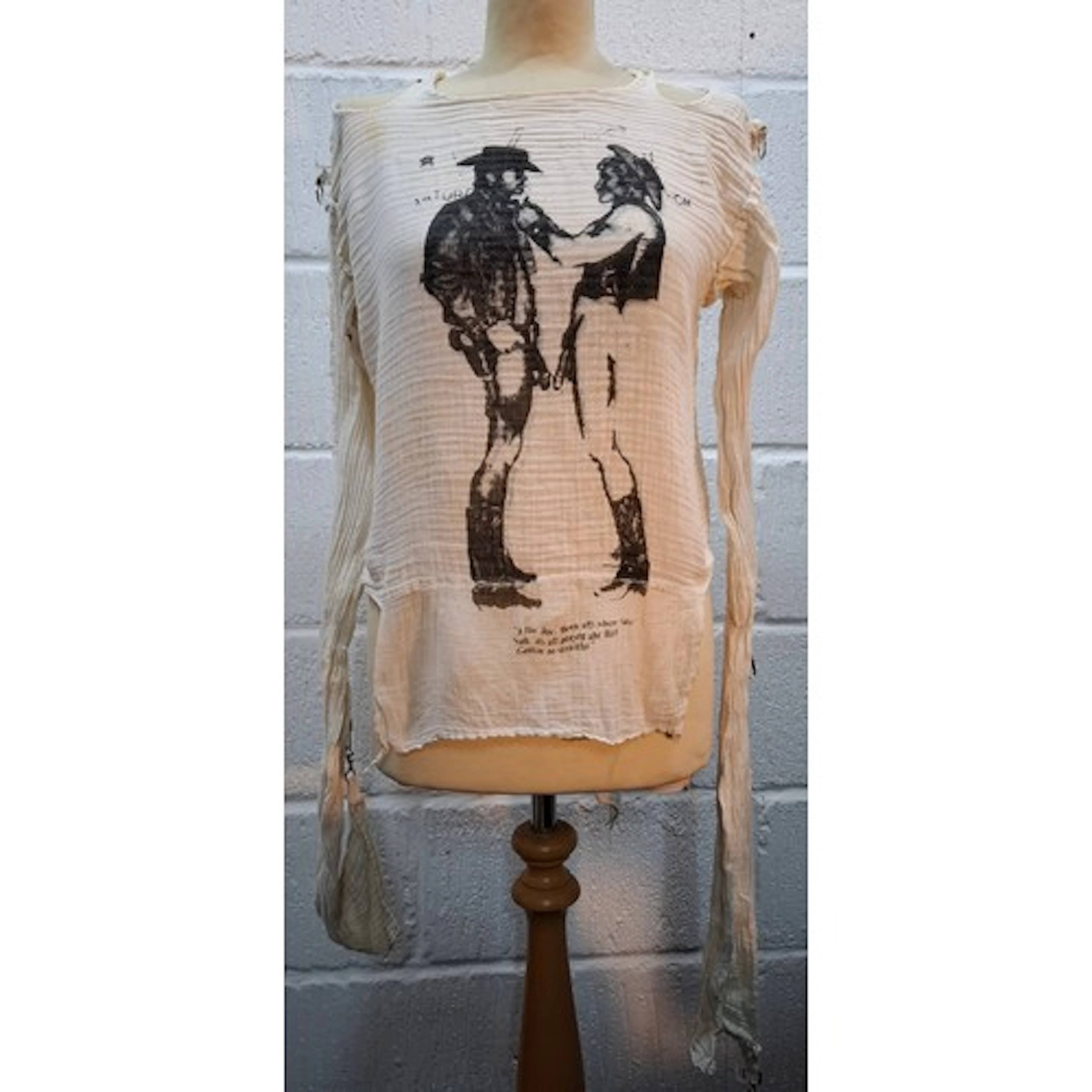 A 1970's Seditionaries style muslin bondage top, cut in whit...