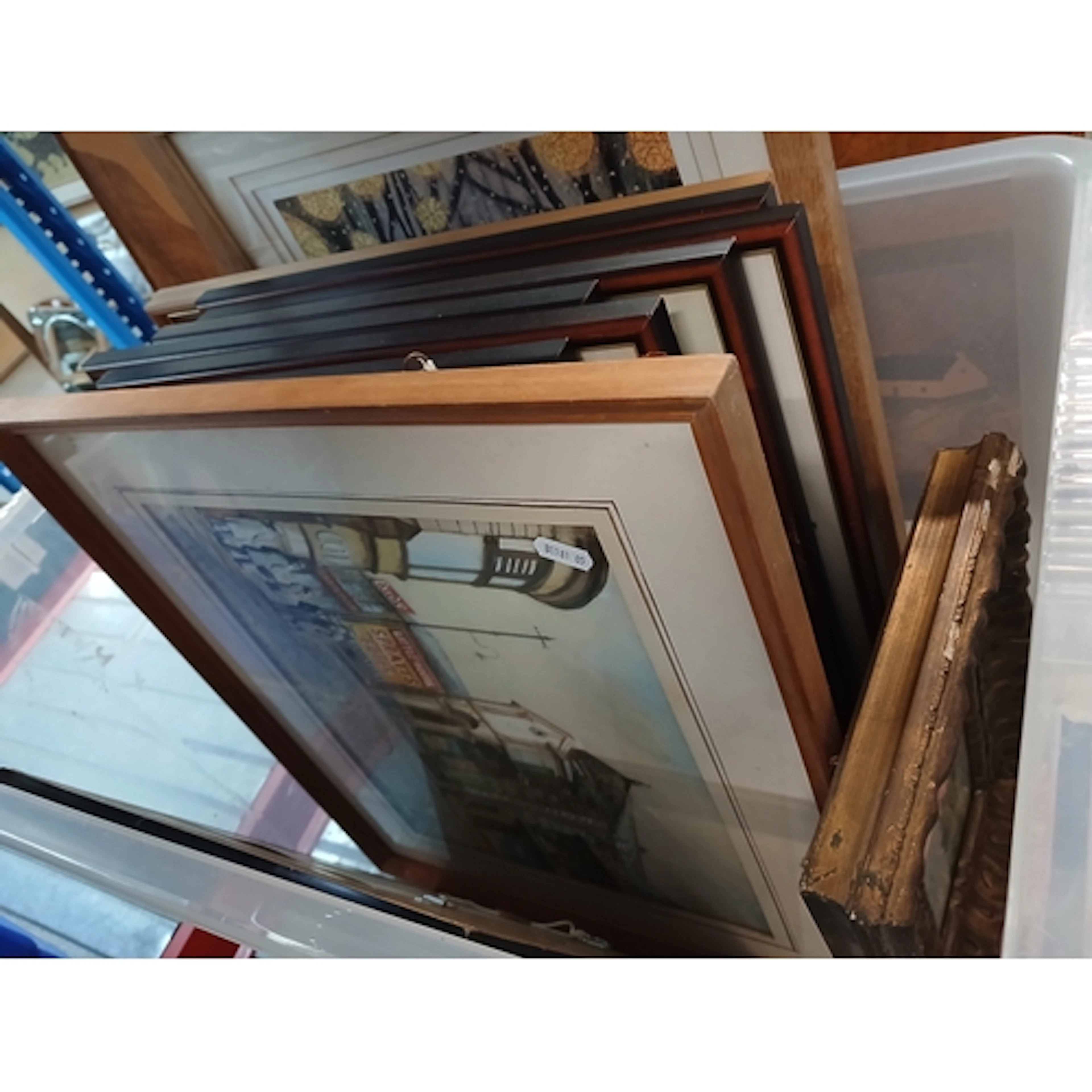 A box of assorted pictures including an early 20th century s...