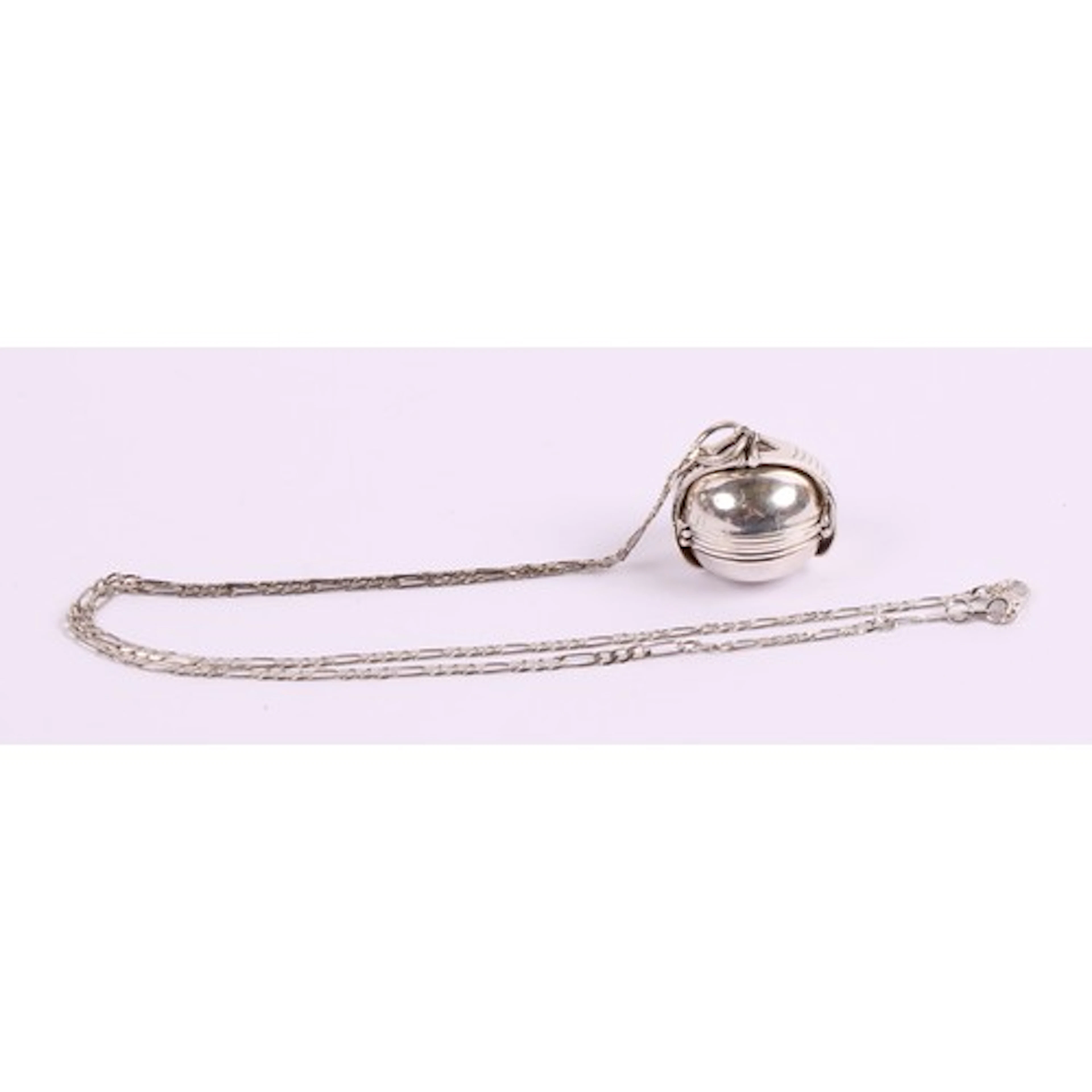 A 20th century sterling silver orb pendant necklace, opening...